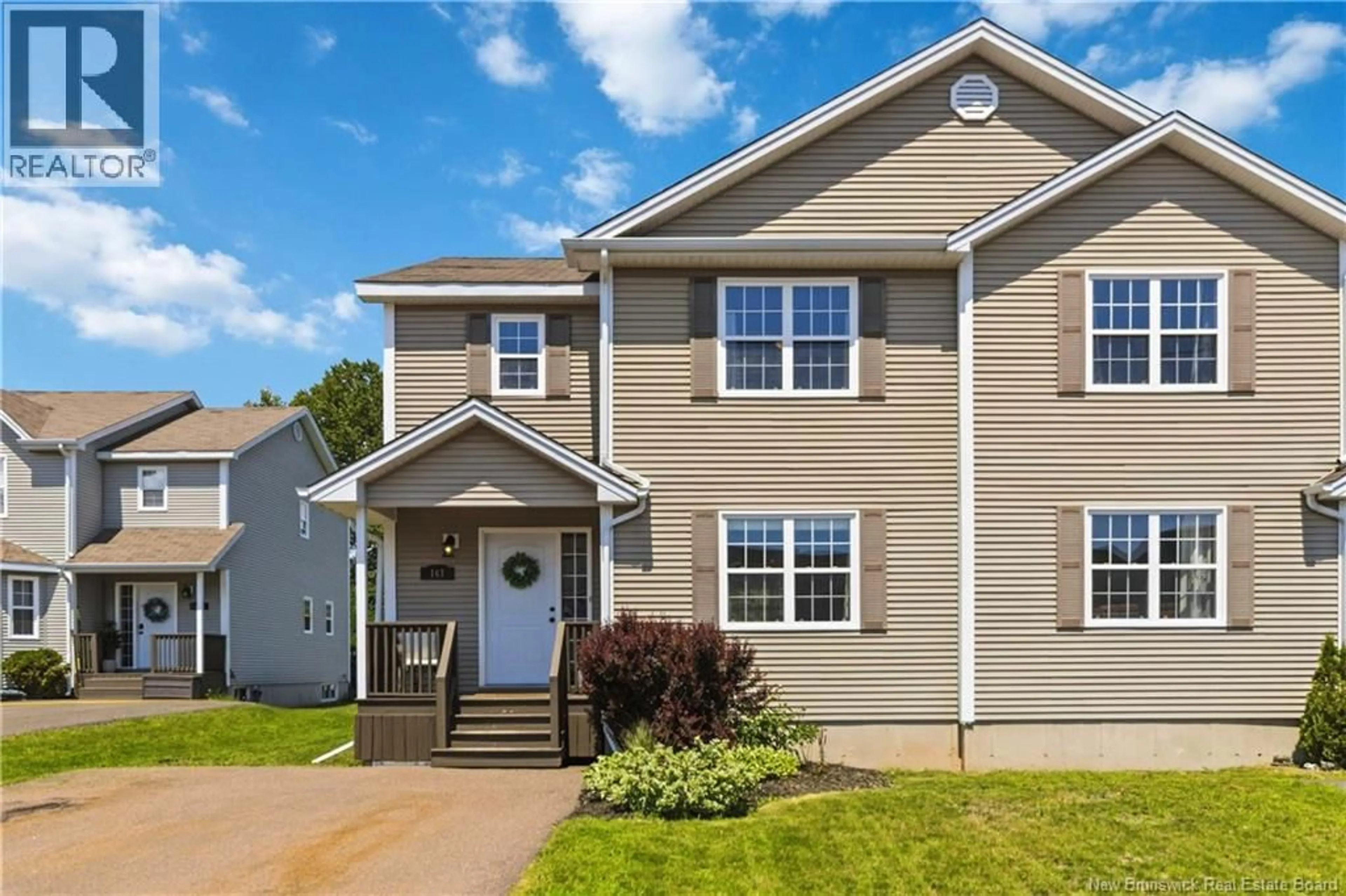 Home with vinyl exterior material, street for 167 HOULAHAN STREET, Dieppe New Brunswick E1A3X6