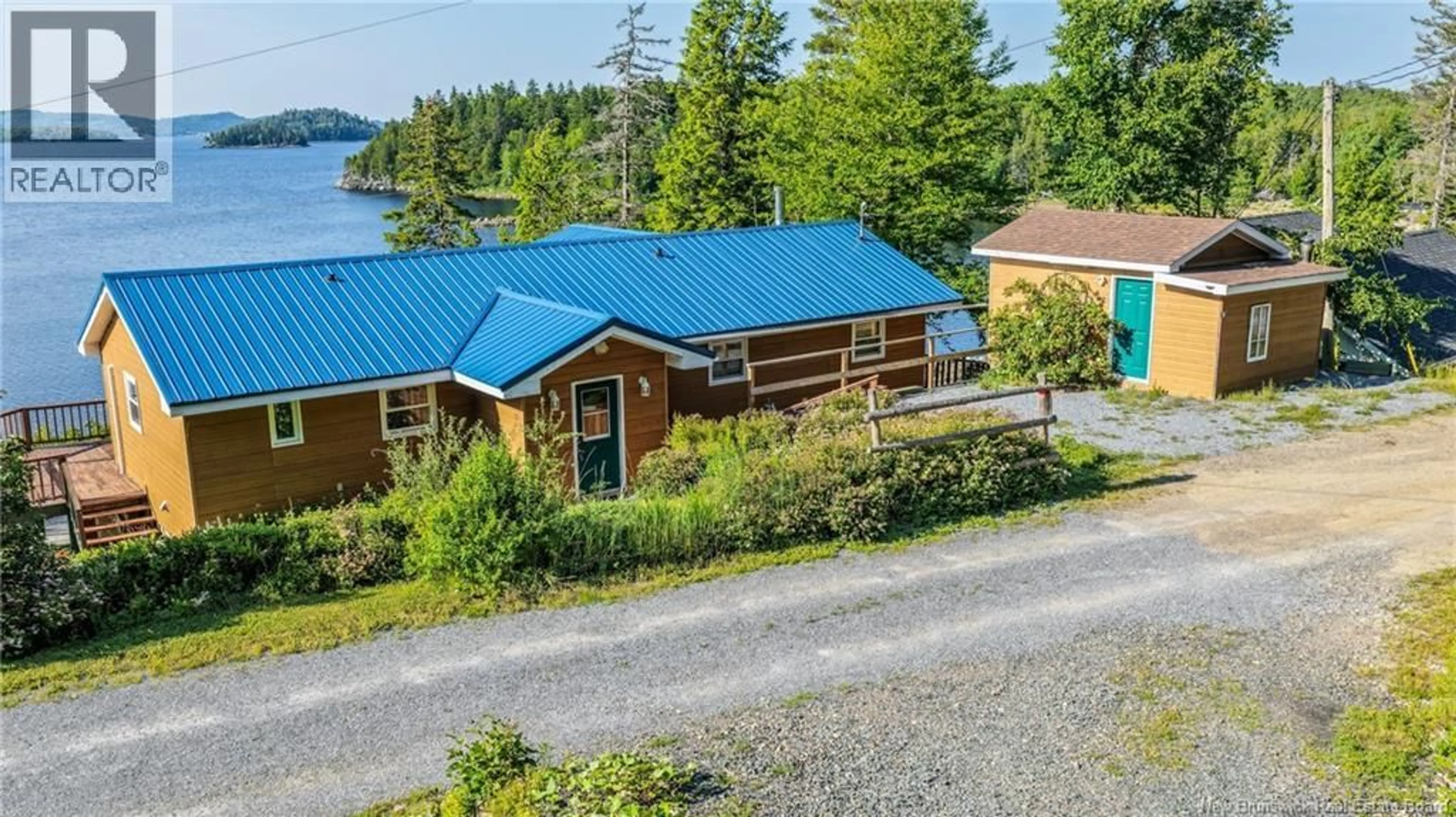 A pic from outside/outdoor area/front of a property/back of a property/a pic from drone, water/lake/river/ocean view for 28 EEL COVE ROAD, Utopia New Brunswick E5C2J4