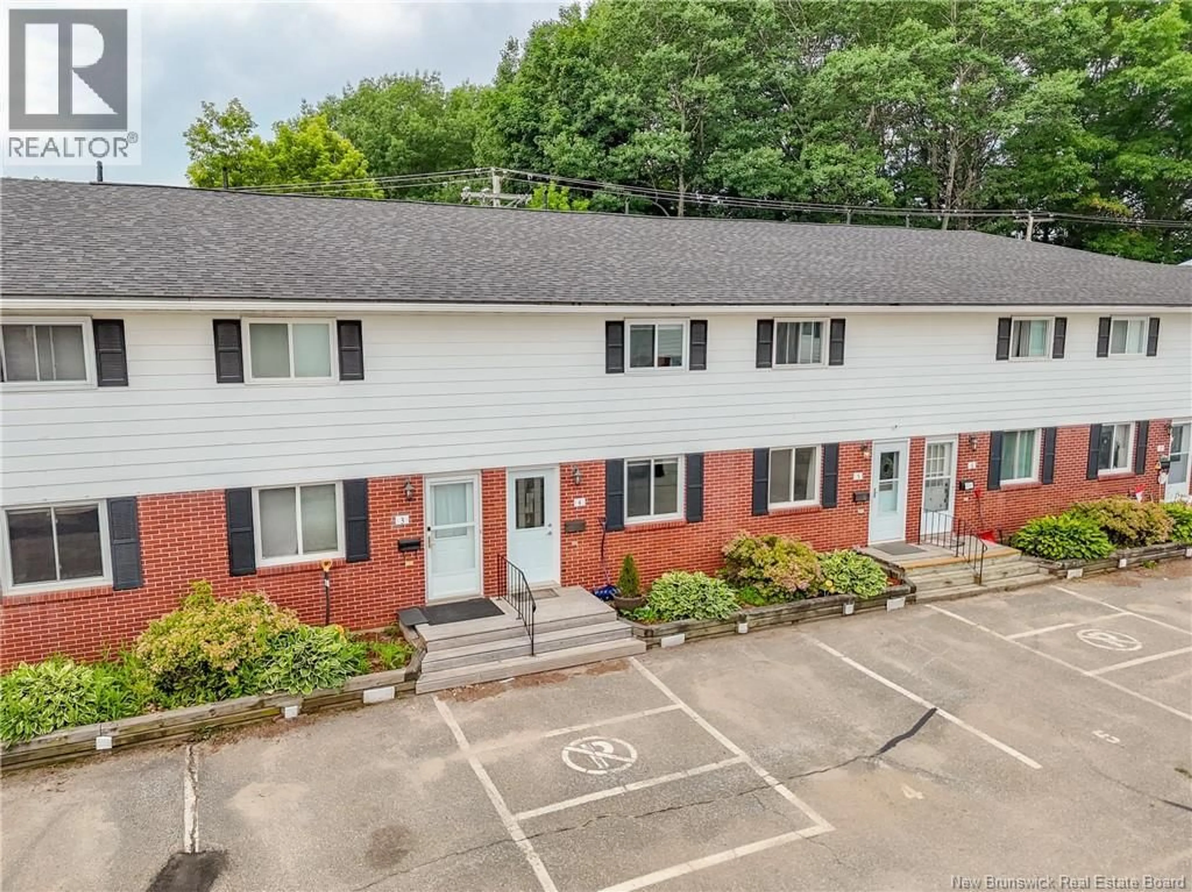 A pic from outside/outdoor area/front of a property/back of a property/a pic from drone, unknown for 4 - 60 COLWELL DRIVE, Fredericton New Brunswick E3A3R6