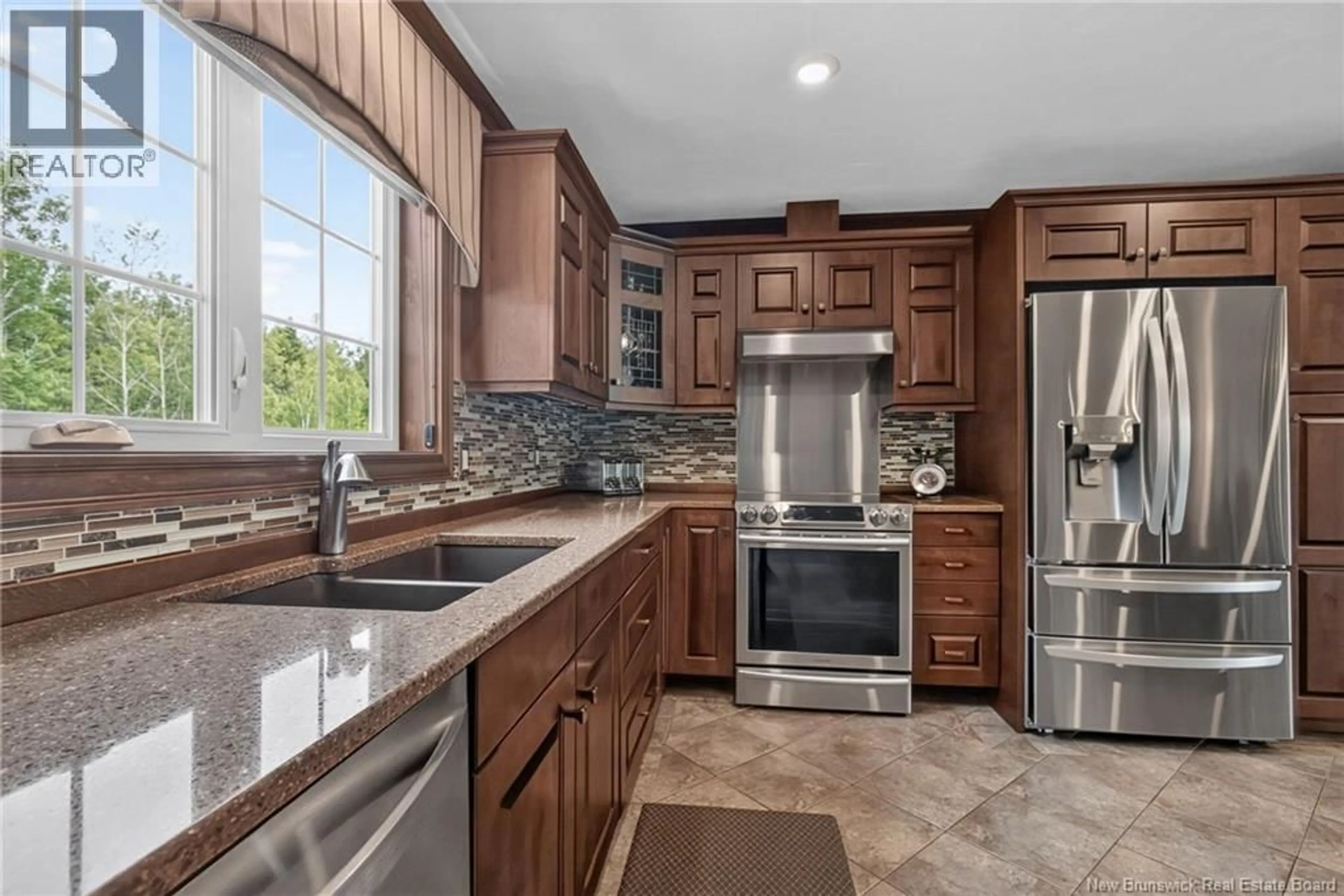 Open concept kitchen, ceramic/tile floor for 115 ROYAL OAKS BOULEVARD, Moncton New Brunswick E1H2P7
