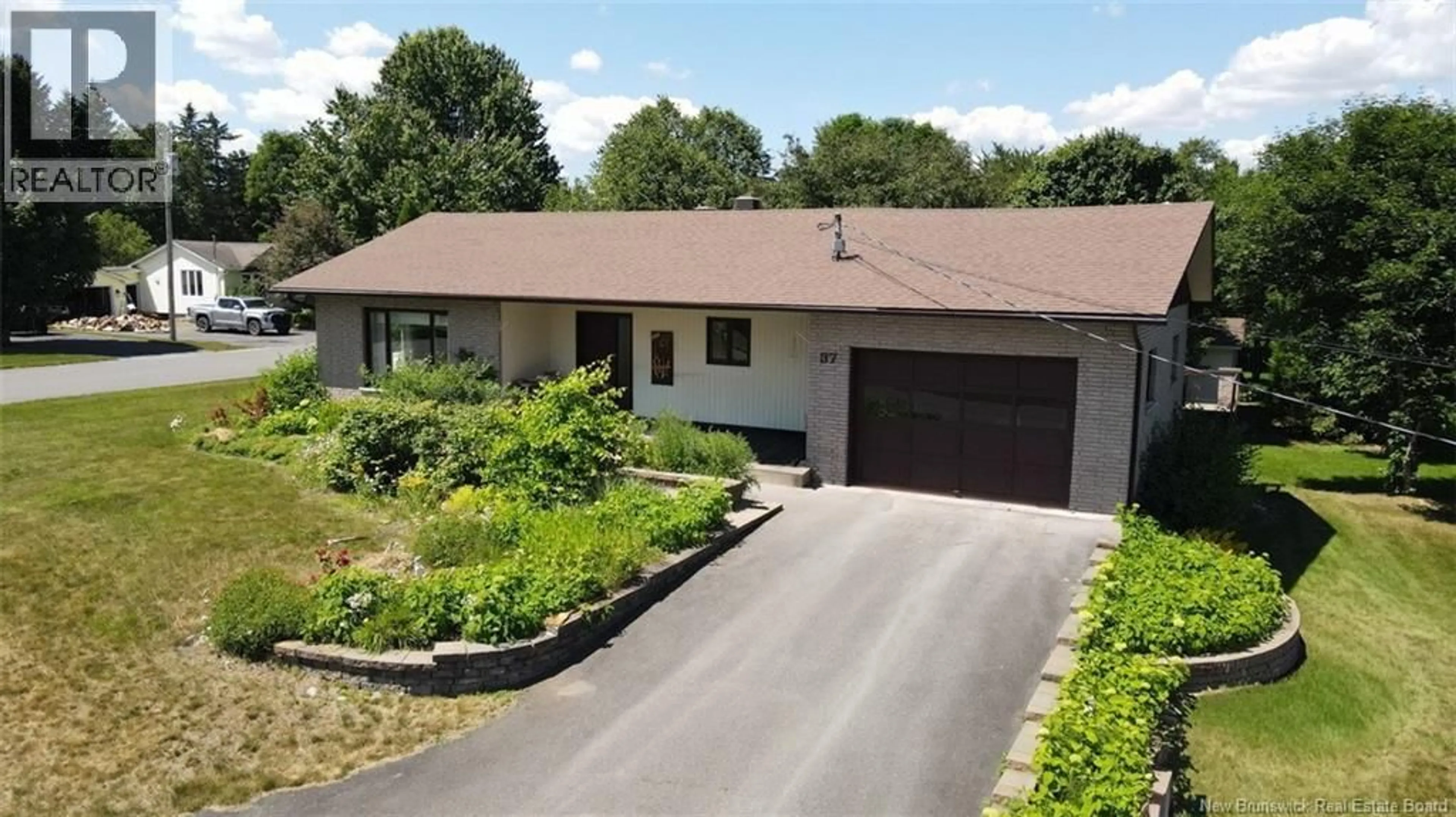 A pic from outside/outdoor area/front of a property/back of a property/a pic from drone, street for 37 THOMAS STREET, Saint-Jacques New Brunswick E7B1P8
