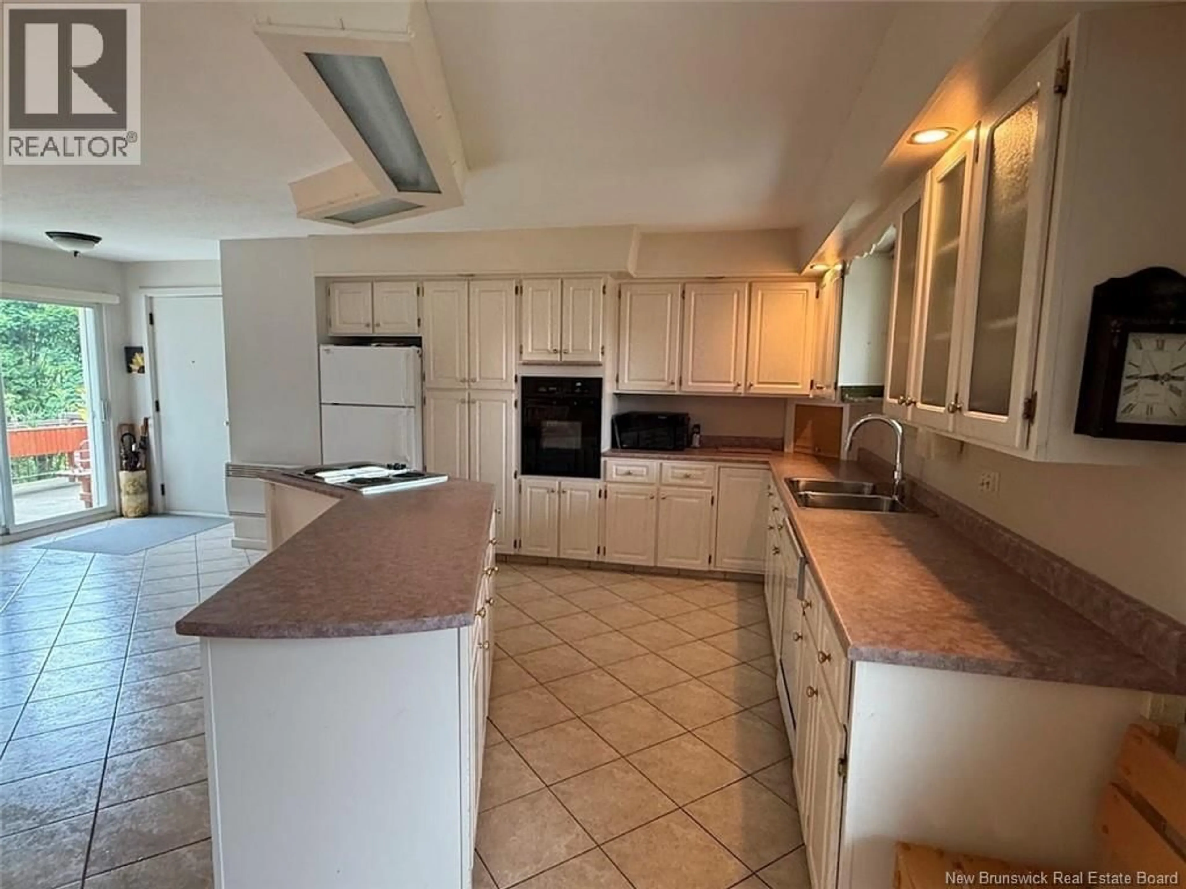 Open concept kitchen, ceramic/tile floor for 37 THOMAS STREET, Saint-Jacques New Brunswick E7B1P8