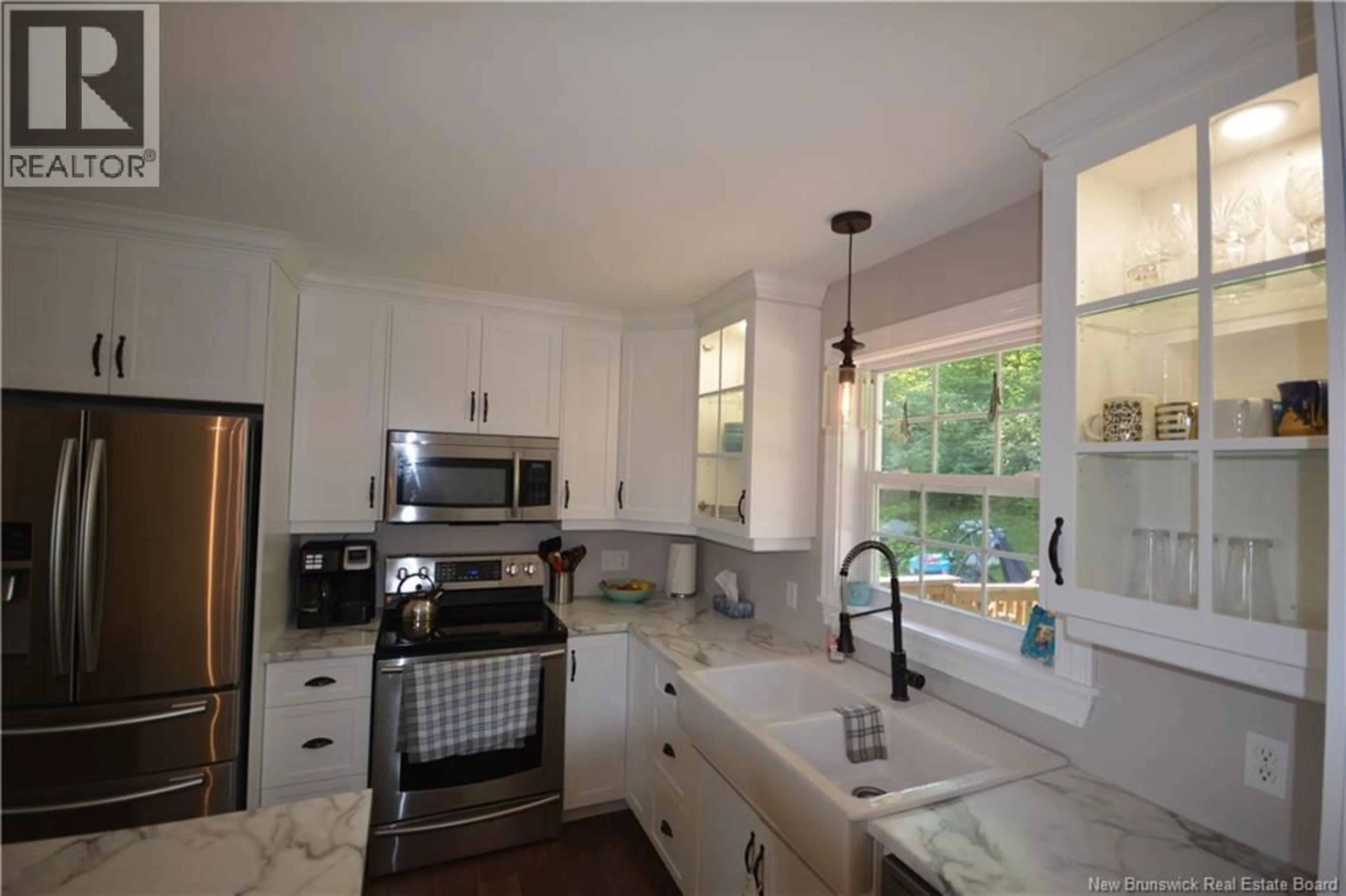 Open concept kitchen, ceramic/tile floor for 33 TOURIST BUREAU ROAD, Richmond Corner New Brunswick E7M4W8