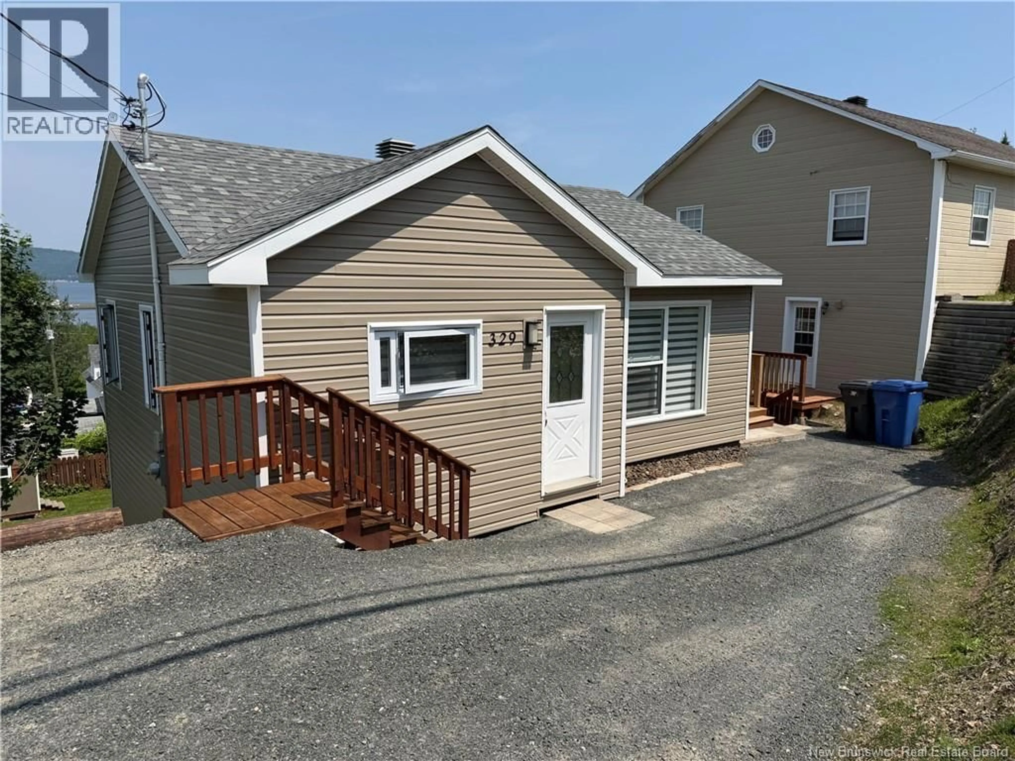 Home with vinyl exterior material, street for 329 VICTORIA STREET, Dalhousie New Brunswick E8C2T7