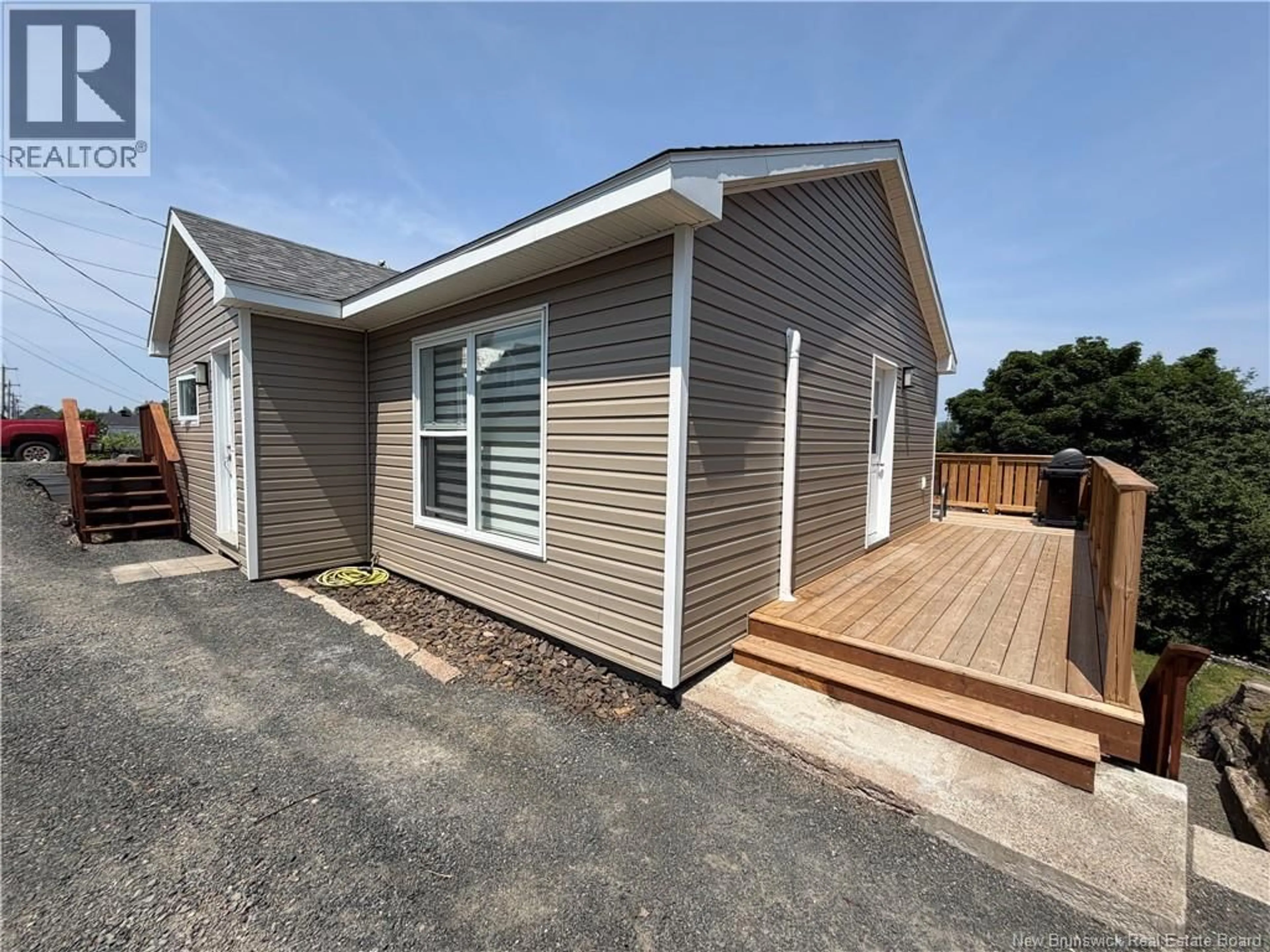 Home with vinyl exterior material, street for 329 VICTORIA STREET, Dalhousie New Brunswick E8C2T7