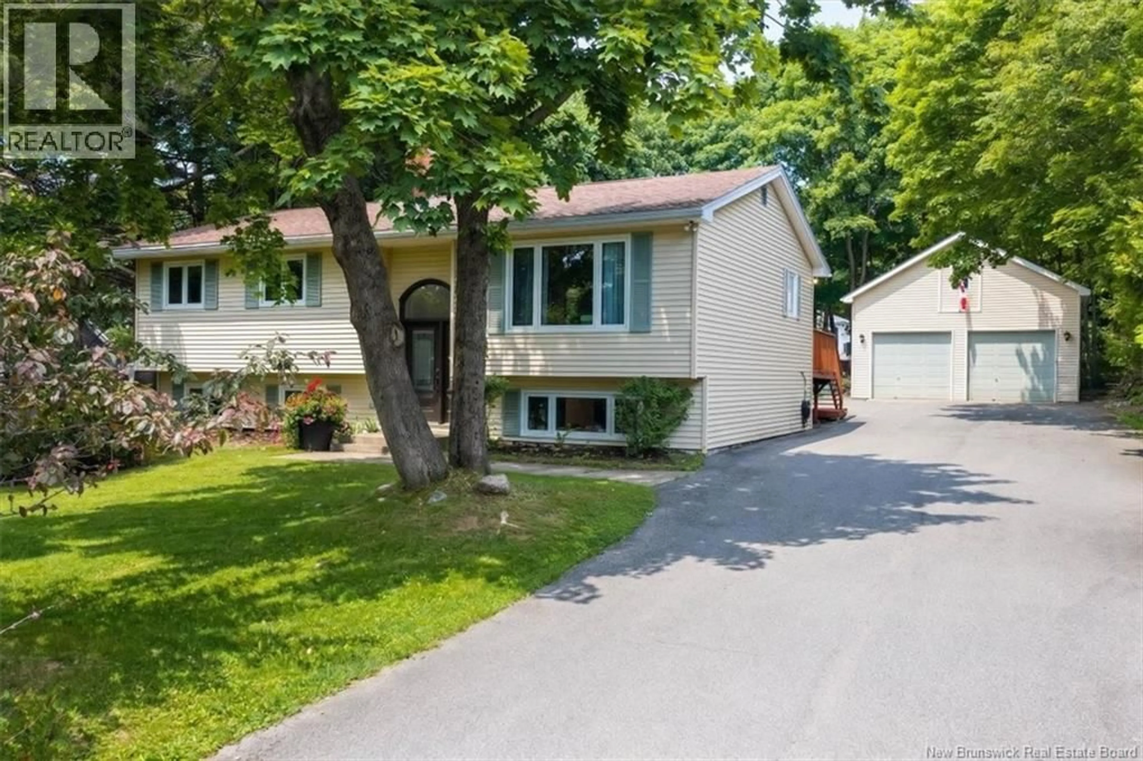 Home with vinyl exterior material, street for 69 RENSHAW ROAD, Rothesay New Brunswick E2H1R7