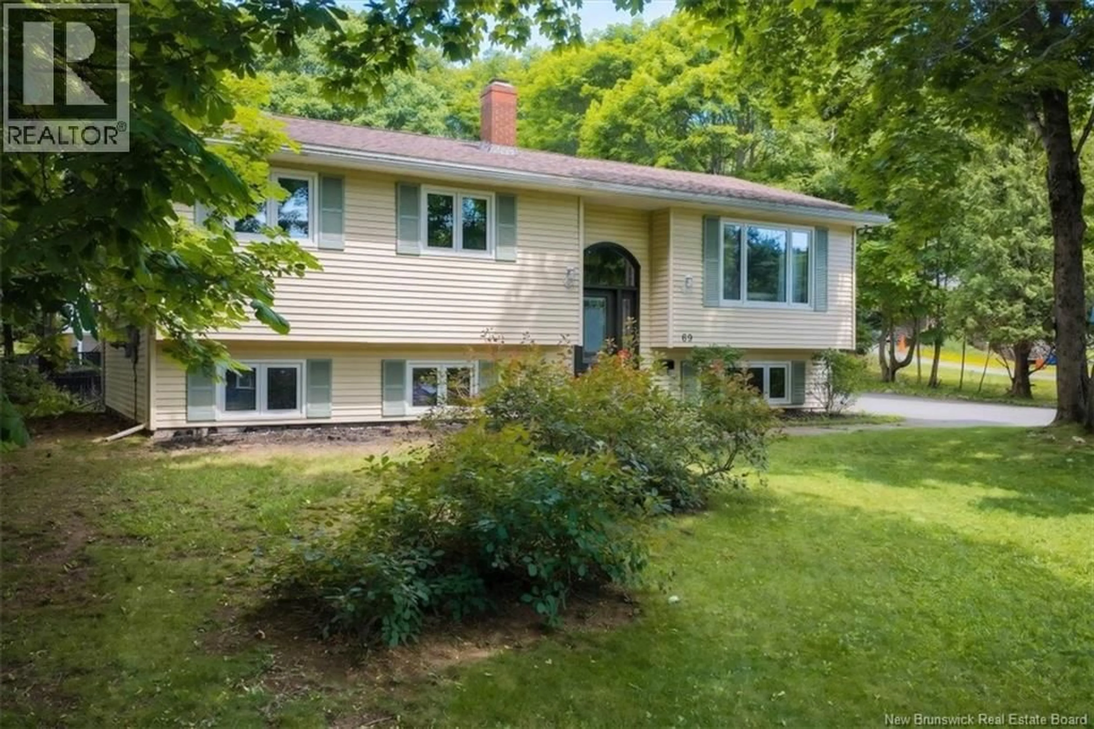 Home with vinyl exterior material, street for 69 RENSHAW ROAD, Rothesay New Brunswick E2H1R7