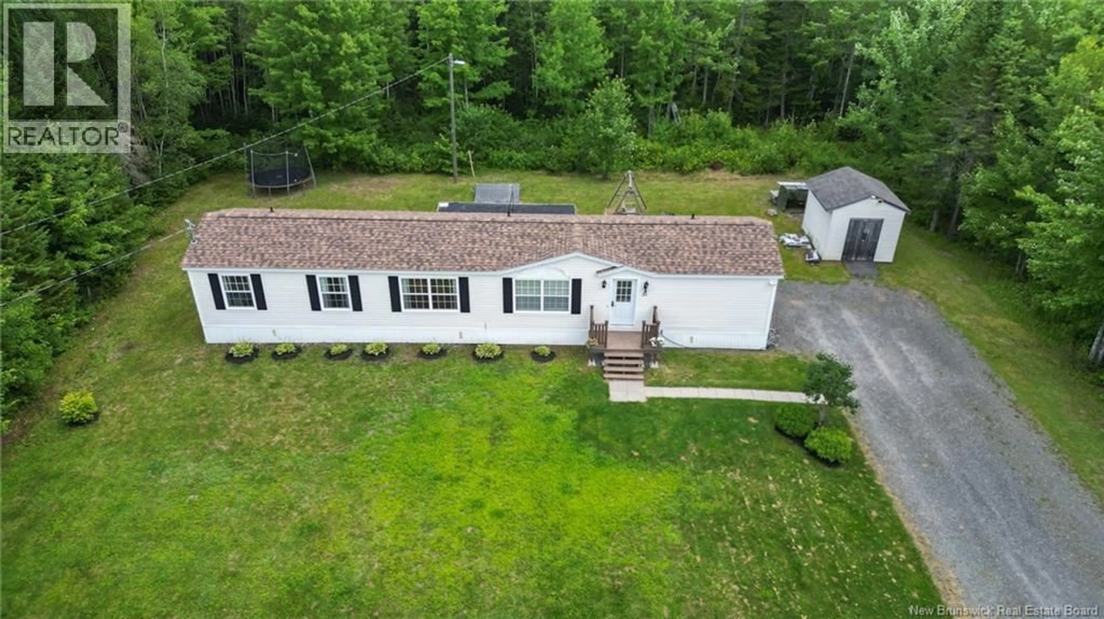 A pic from outside/outdoor area/front of a property/back of a property/a pic from drone, unknown for 31 WENDY CRESCENT, Rusagonis New Brunswick E3B0M5