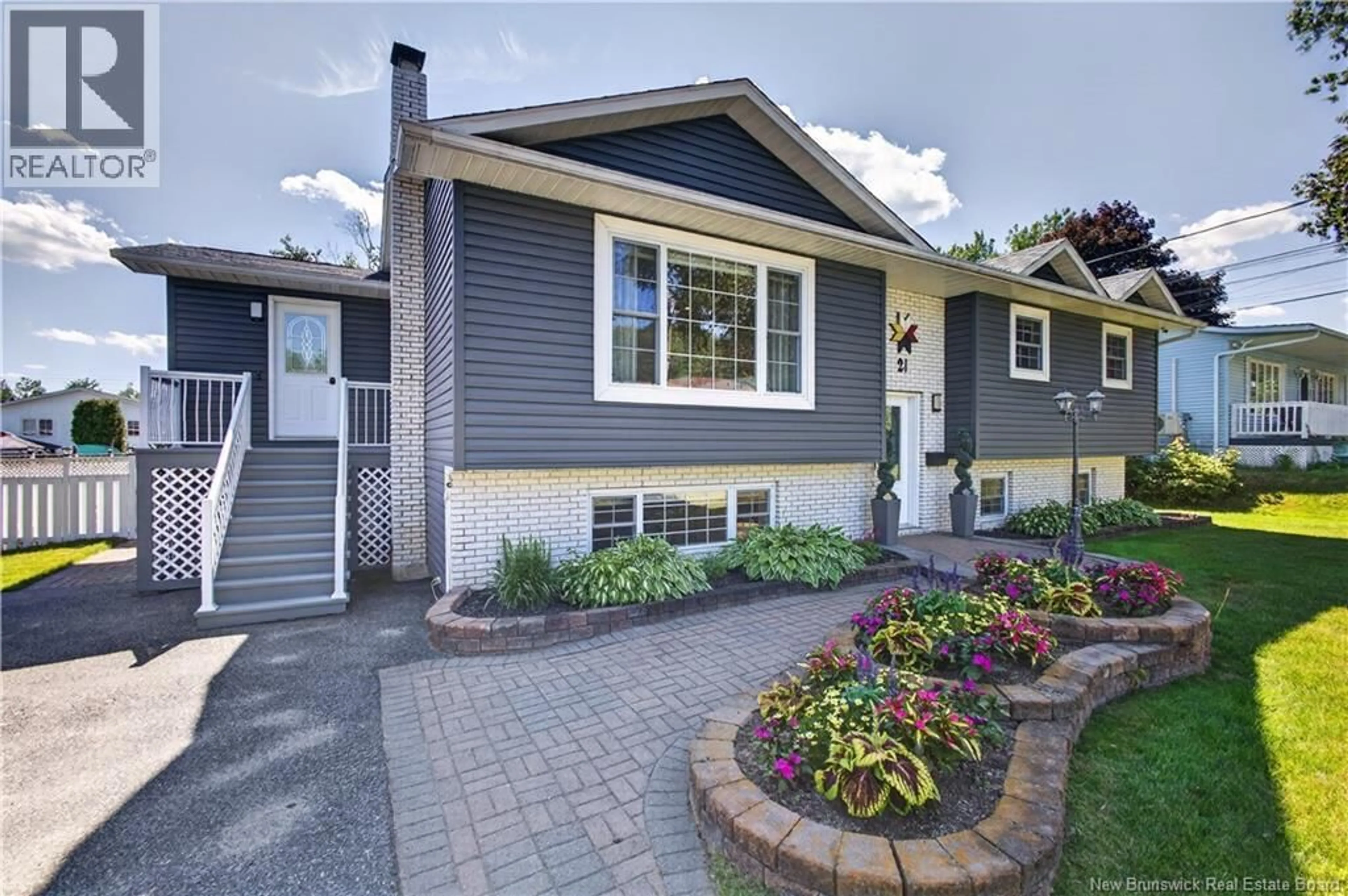 Home with vinyl exterior material, street for 21 ADAMS AVENUE, Miramichi New Brunswick E1V3Y6