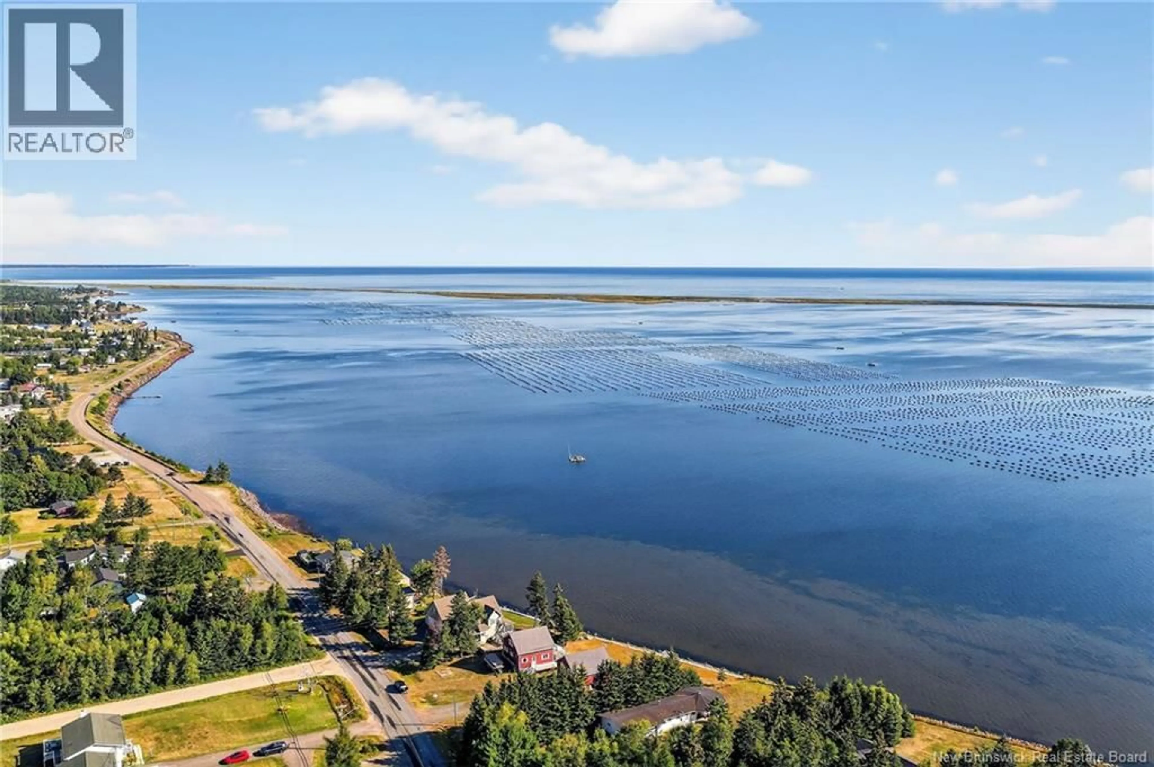 A pic from outside/outdoor area/front of a property/back of a property/a pic from drone, water/lake/river/ocean view for 928 ROUTE 475, Bouctouche Bay New Brunswick E4S4P9