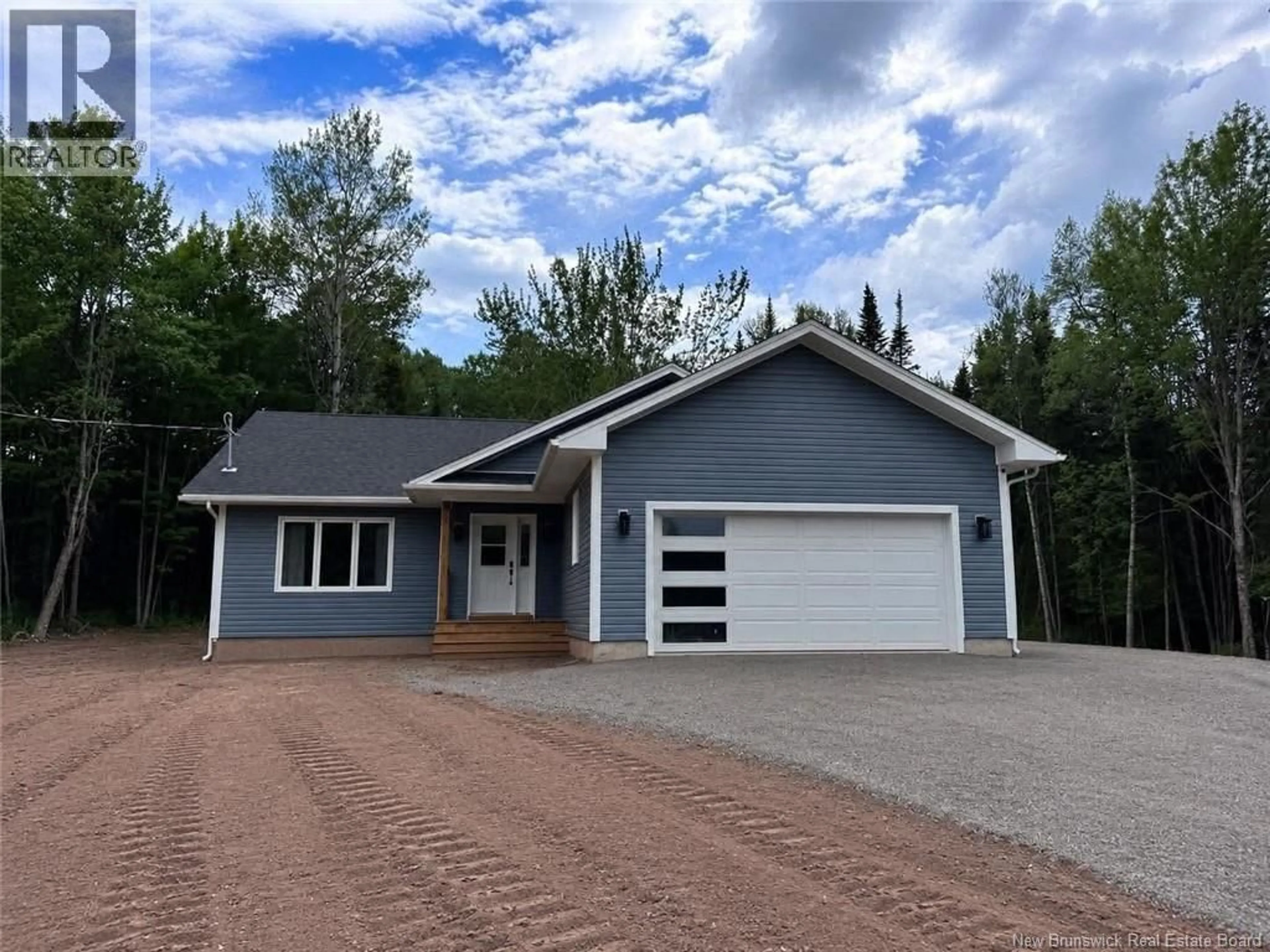 Home with vinyl exterior material, street for 5404 ROUTE 895, Colpitts Settlement New Brunswick E4J2Z6