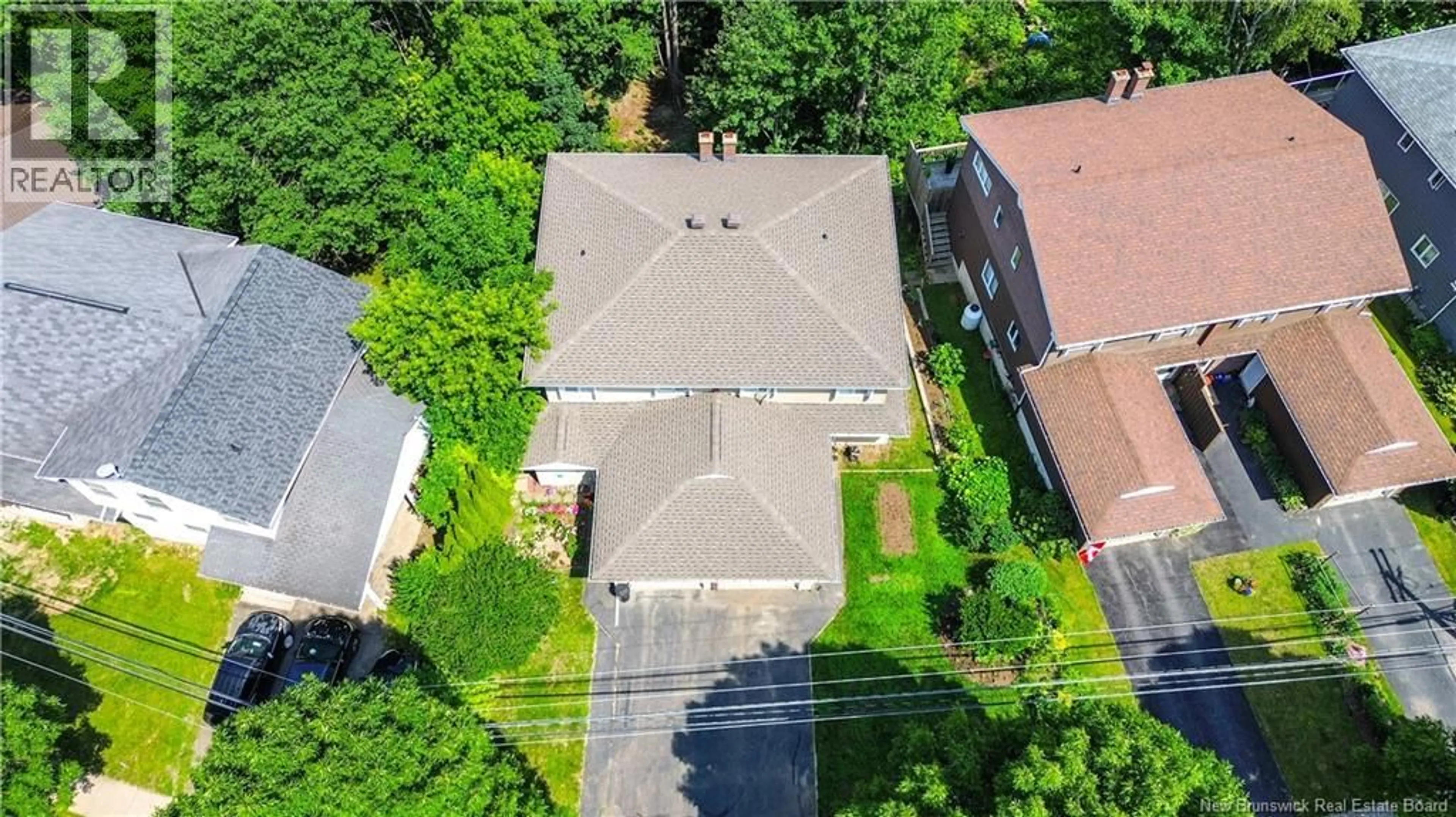 A pic from outside/outdoor area/front of a property/back of a property/a pic from drone, street for 29 BIGGS STREET, Fredericton New Brunswick E3B6H8