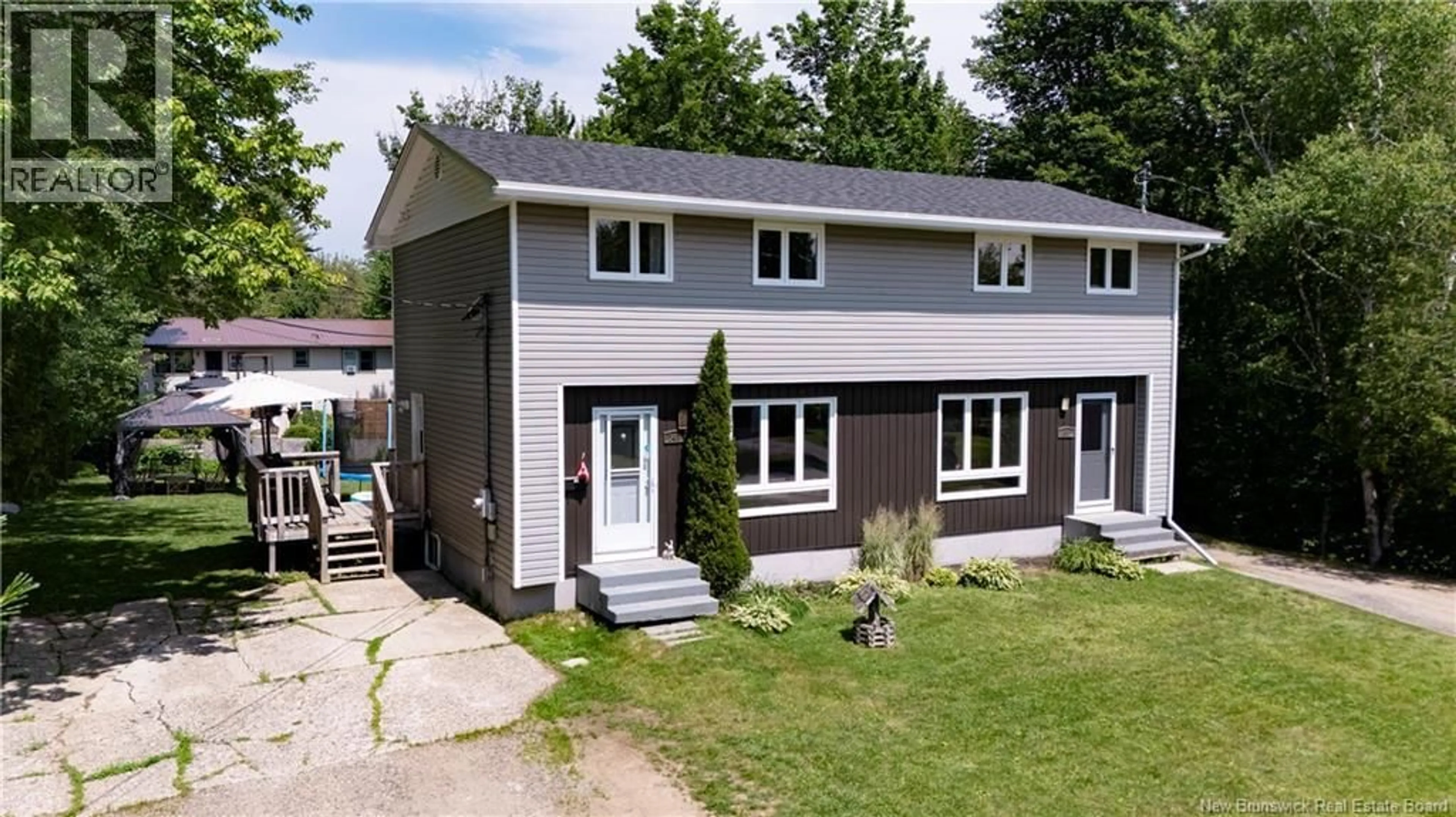 Home with vinyl exterior material, street for 243 SUNRISE ESTATES DRIVE, New Maryland New Brunswick E3C1G7