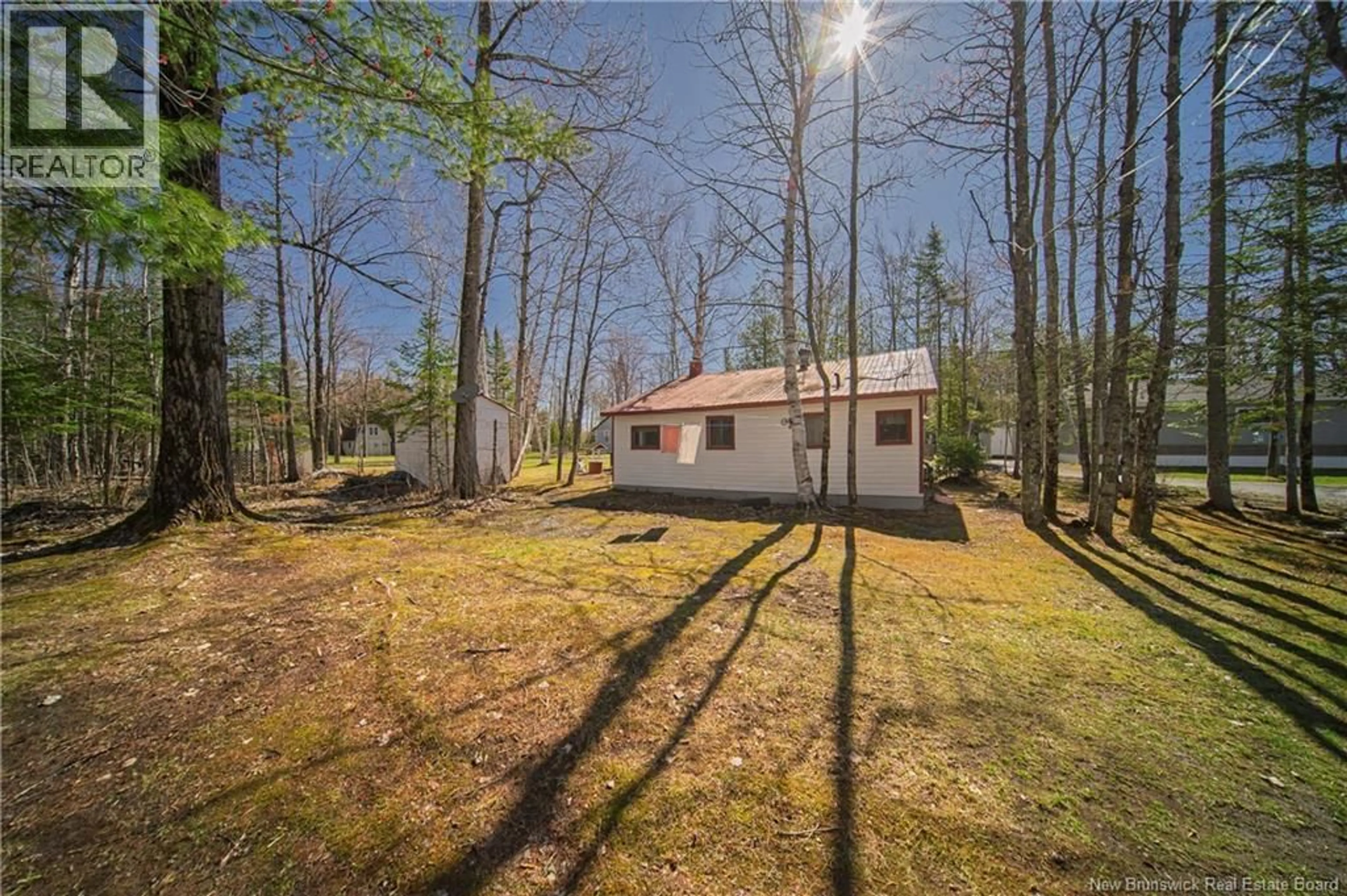 A pic from outside/outdoor area/front of a property/back of a property/a pic from drone, forest/trees view for 9 CURTIS LANE, Davidson Lake New Brunswick E6H2R9