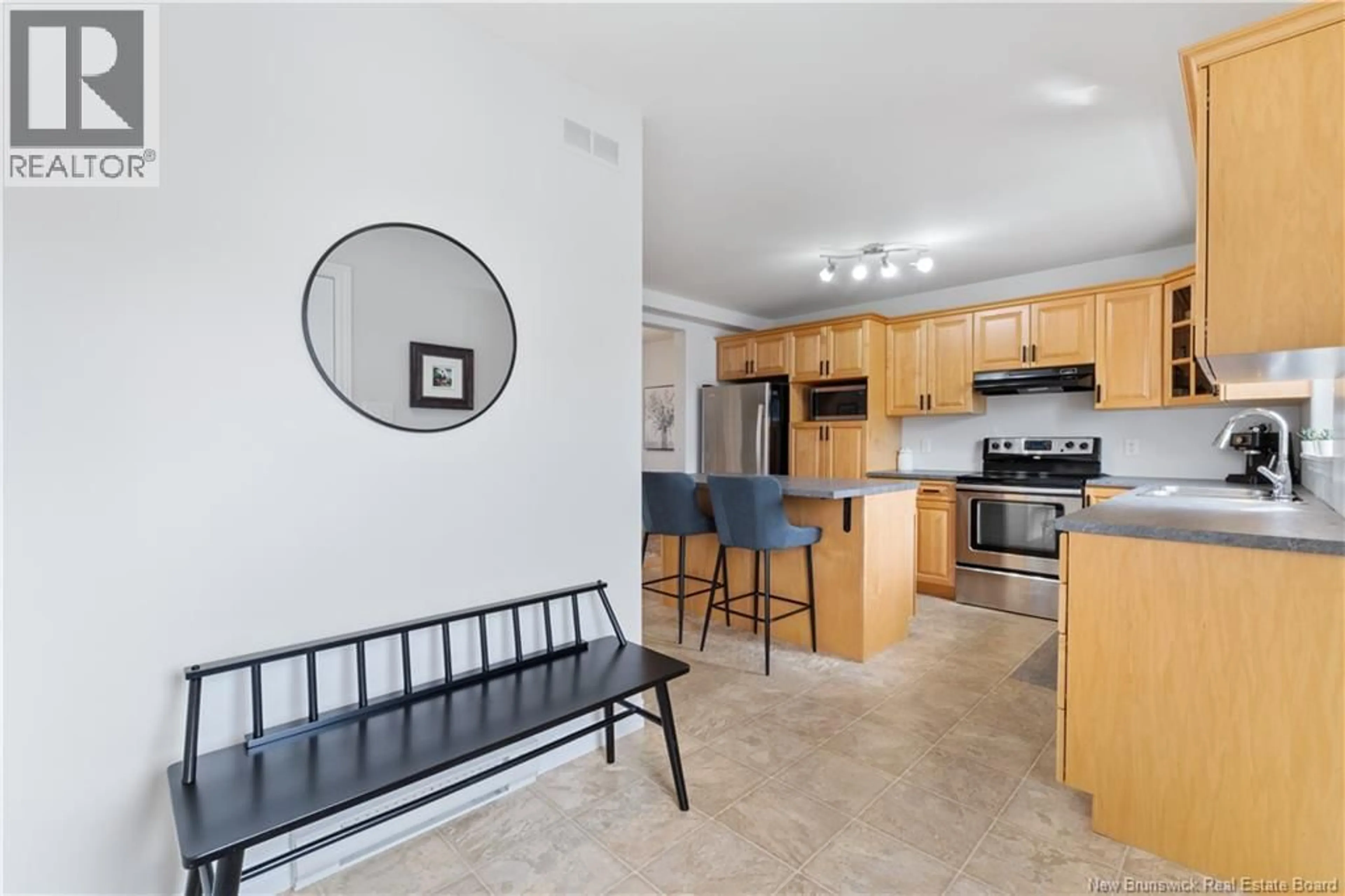 Open concept kitchen, ceramic/tile floor for 233 DAMIEN, Dieppe New Brunswick E1A5N9