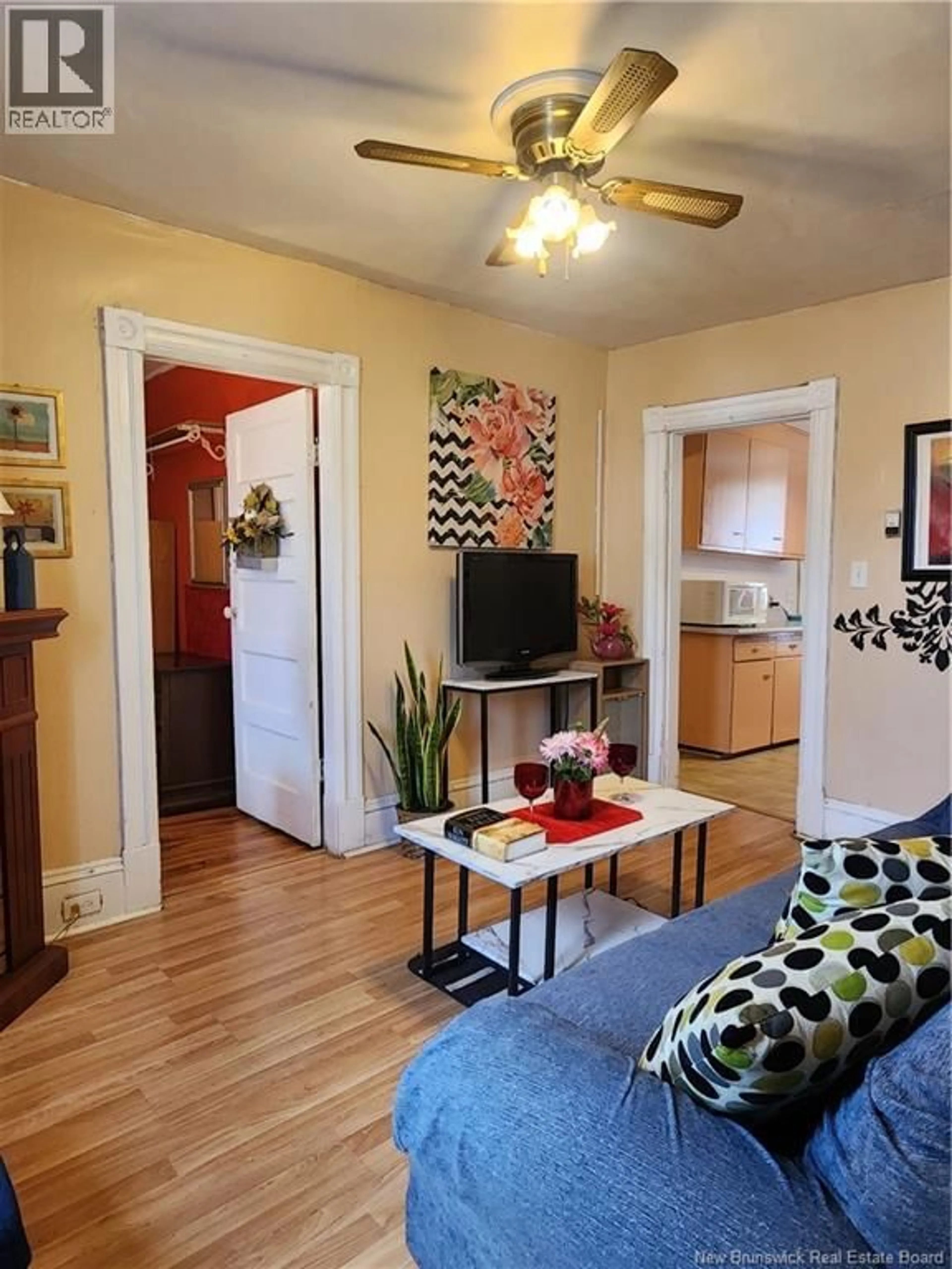 Living room with furniture, wood/laminate floor for 130 VISART STREET, Saint John New Brunswick E2K1N8
