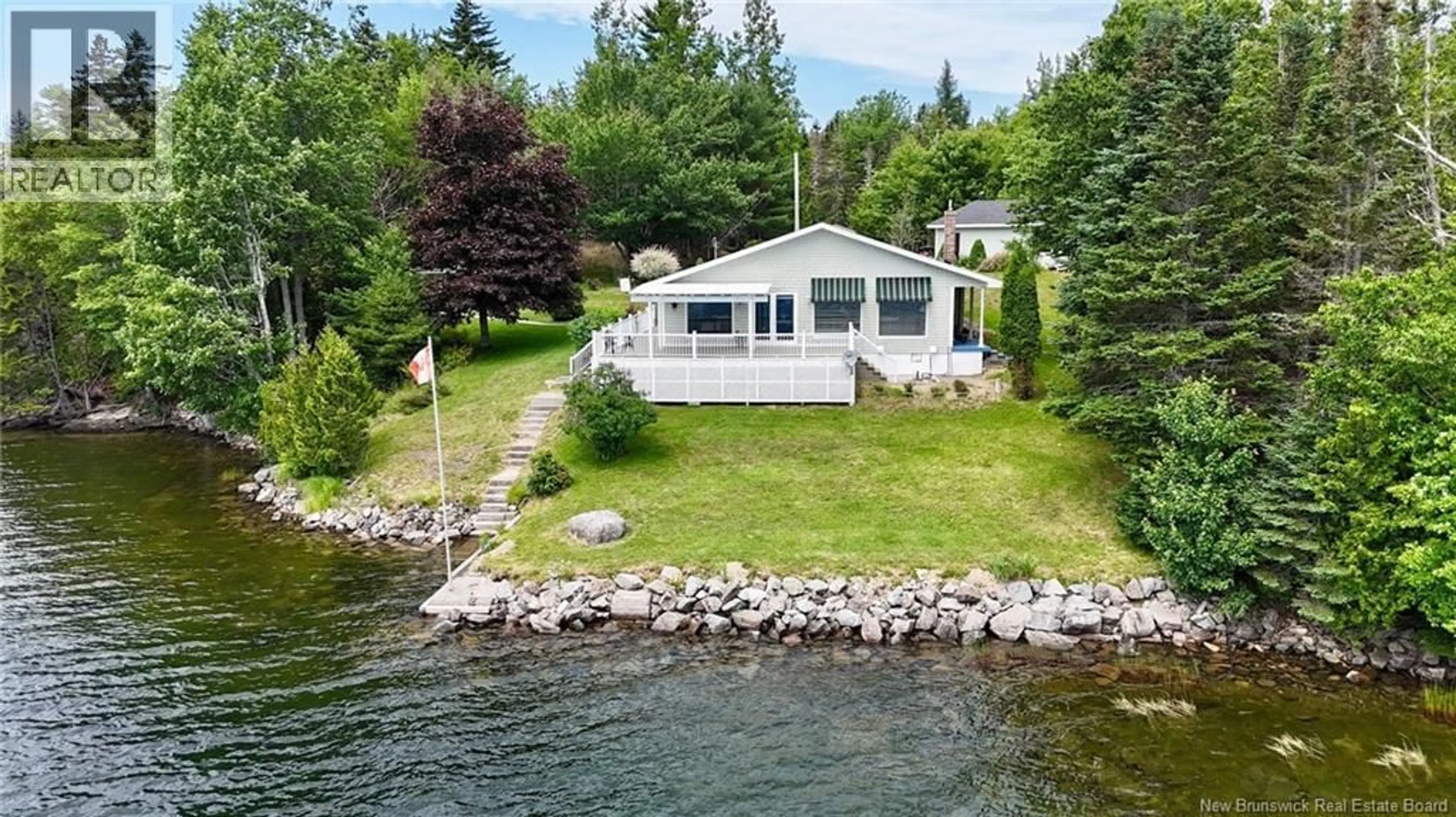 A pic from outside/outdoor area/front of a property/back of a property/a pic from drone, water/lake/river/ocean view for 106 LAKESIDE DR, Bayside New Brunswick E5B2X9