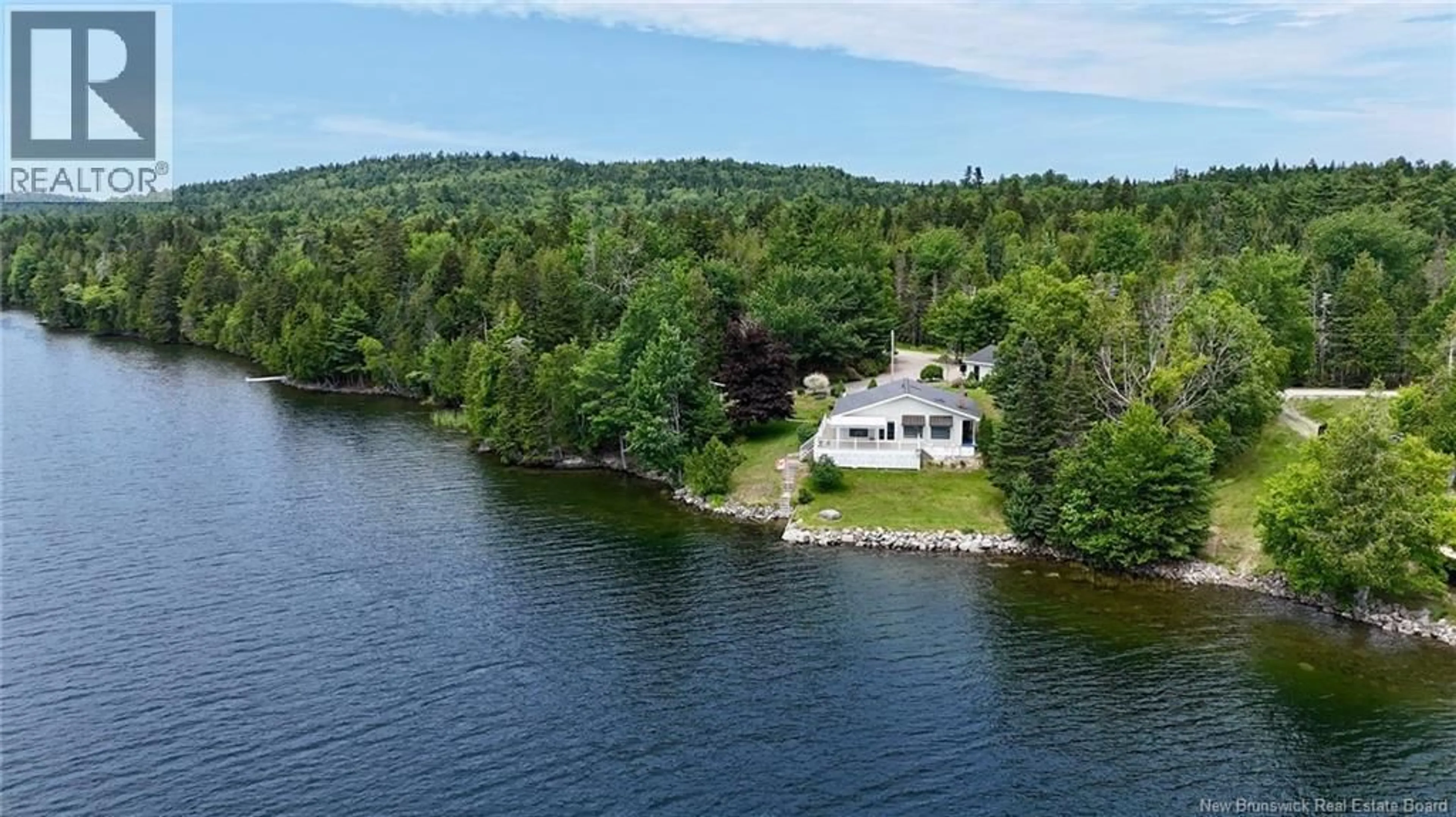 A pic from outside/outdoor area/front of a property/back of a property/a pic from drone, water/lake/river/ocean view for 106 LAKESIDE DR, Bayside New Brunswick E5B2X9