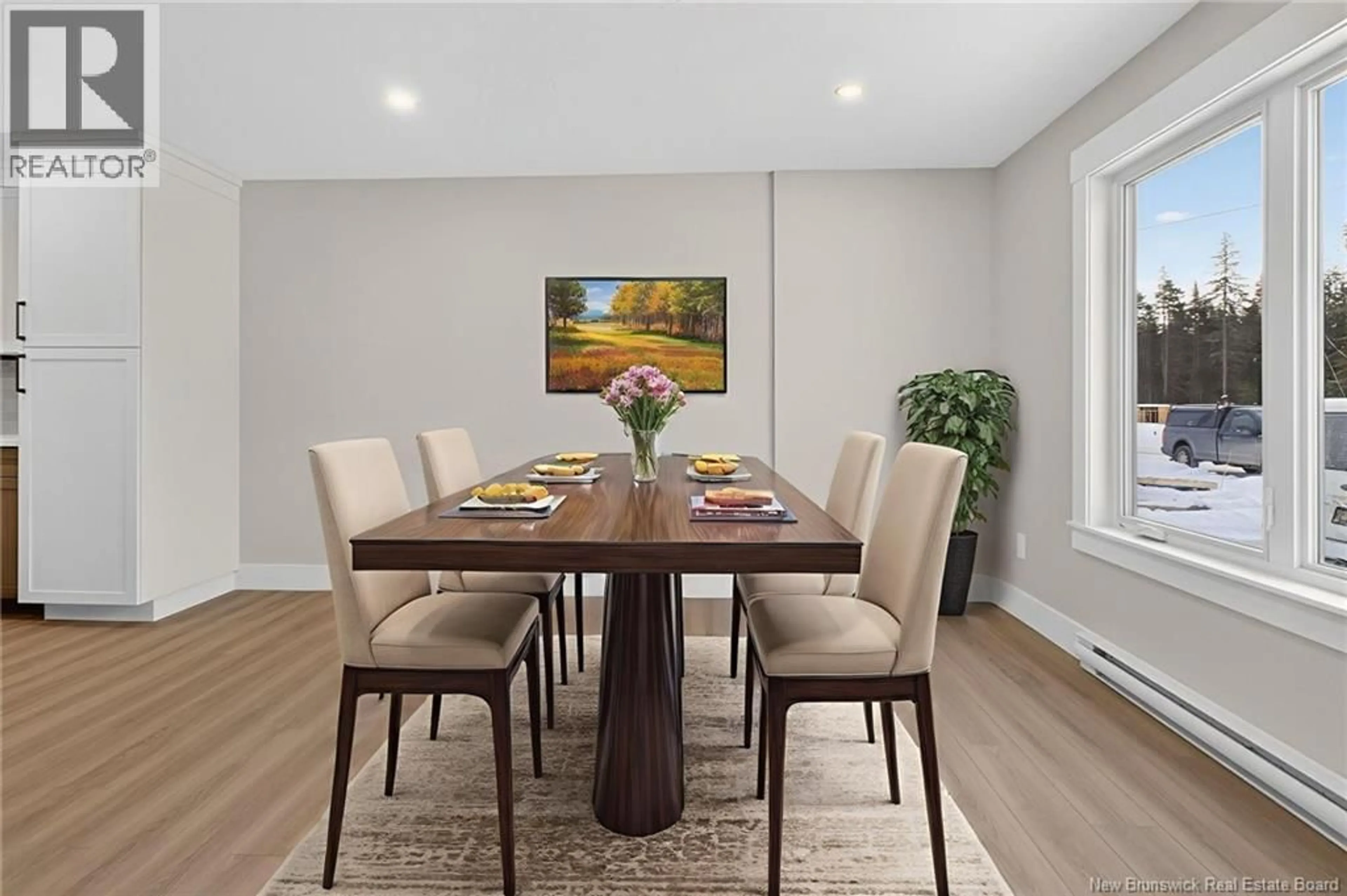 Dining room, wood/laminate floor for 184 DES ELEVES STREET, Dieppe New Brunswick E1A4V6