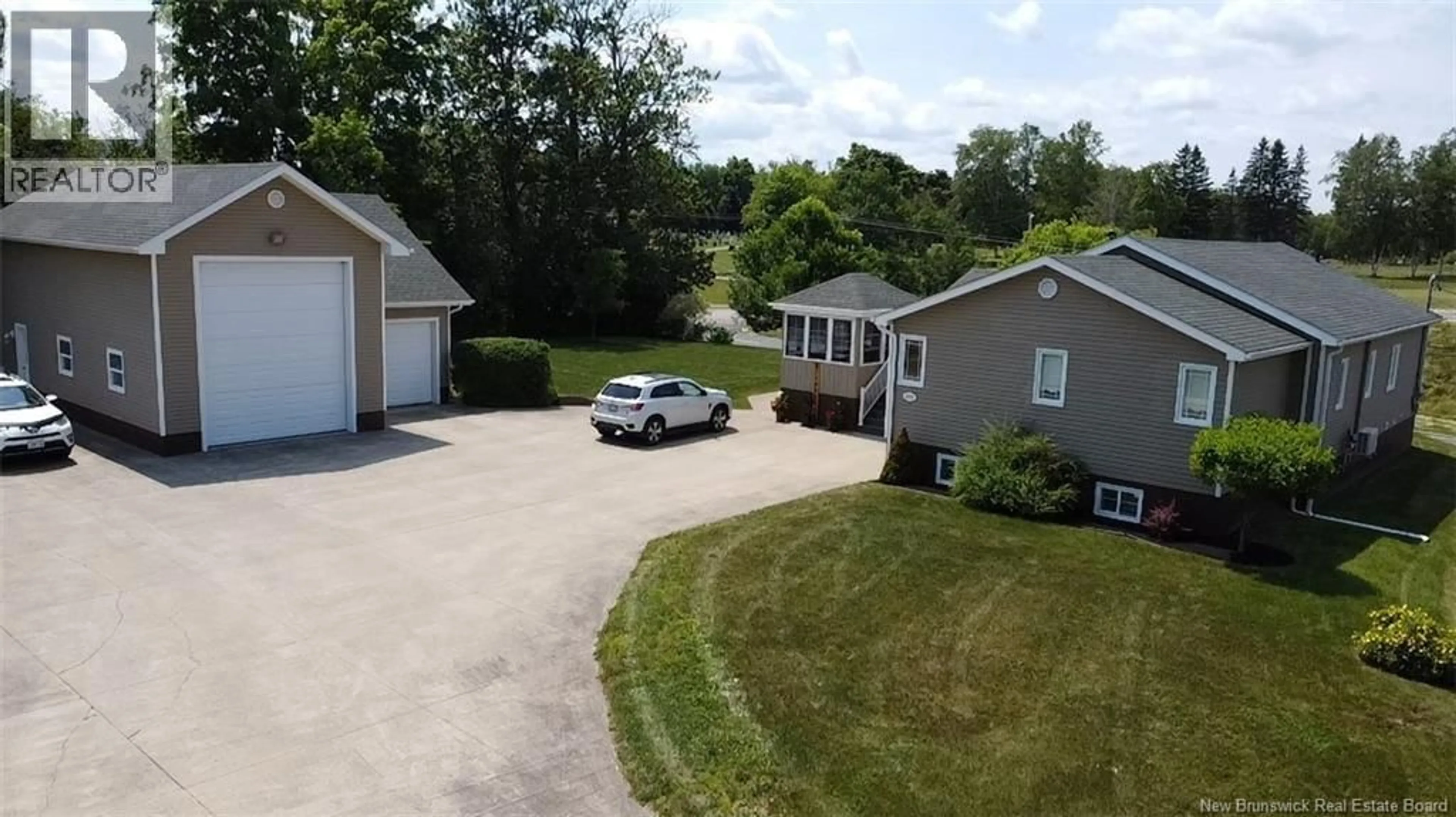 A pic from outside/outdoor area/front of a property/back of a property/a pic from drone, street for 255 LYNCH LANE, Bathurst New Brunswick E2A5A9