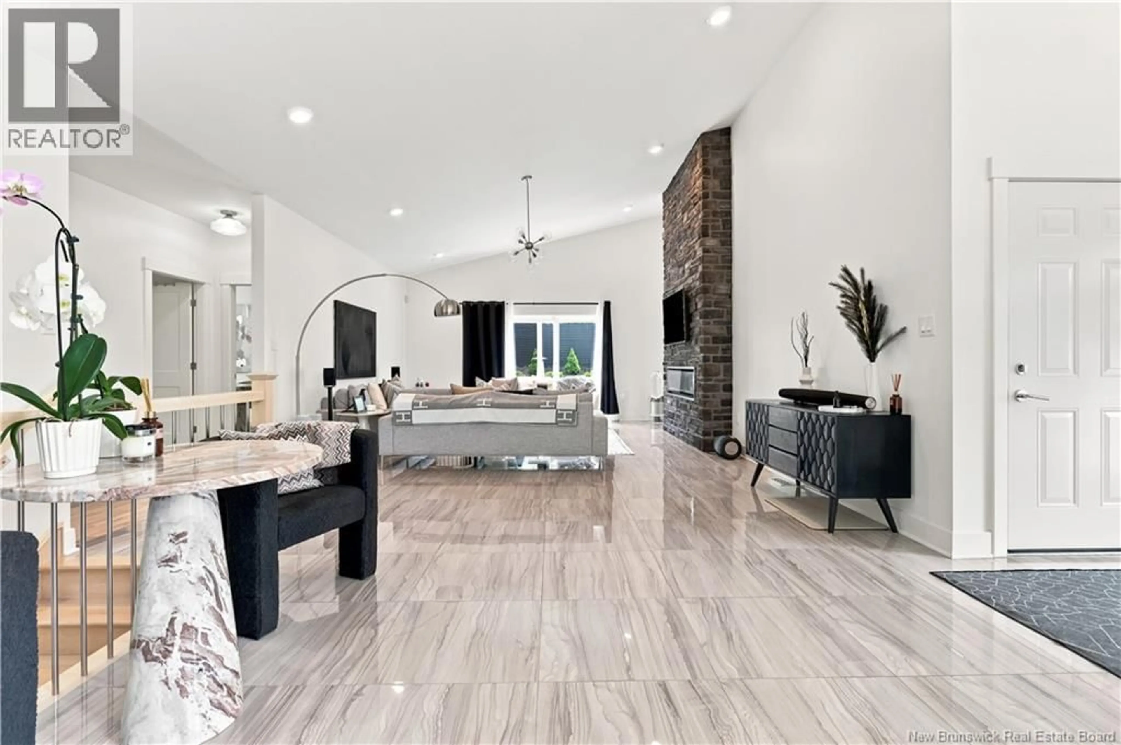 Living room with furniture, ceramic/tile floor for 715 GOLF CLUB ROAD, Fredericton New Brunswick E3B7S5