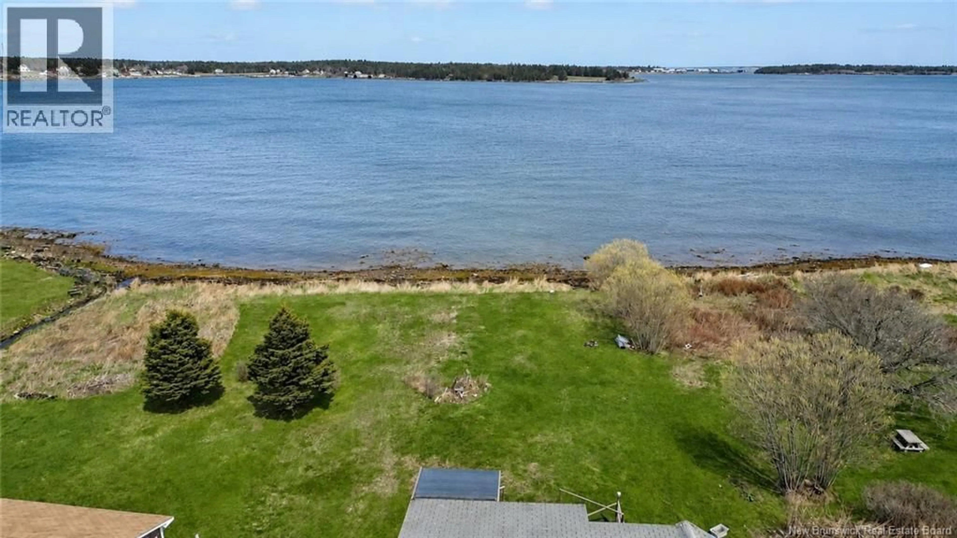 A pic from outside/outdoor area/front of a property/back of a property/a pic from drone, water/lake/river/ocean view for 89 INGALLS HEAD ROAD, Grand Manan New Brunswick E5G3G3