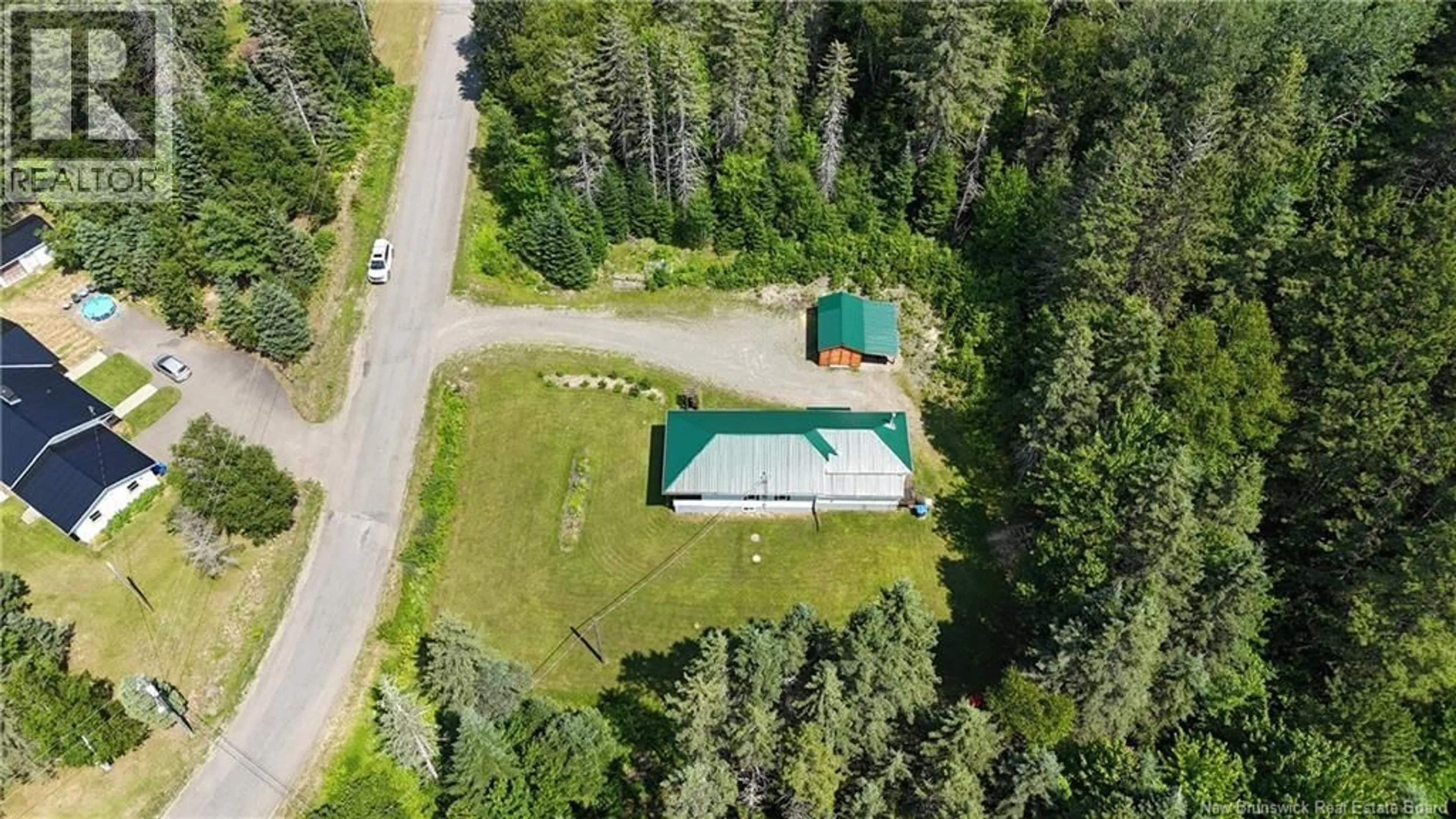 A pic from outside/outdoor area/front of a property/back of a property/a pic from drone, unknown for 65 WOODLAND CRESCENT, Perth-Andover New Brunswick E7H5H2