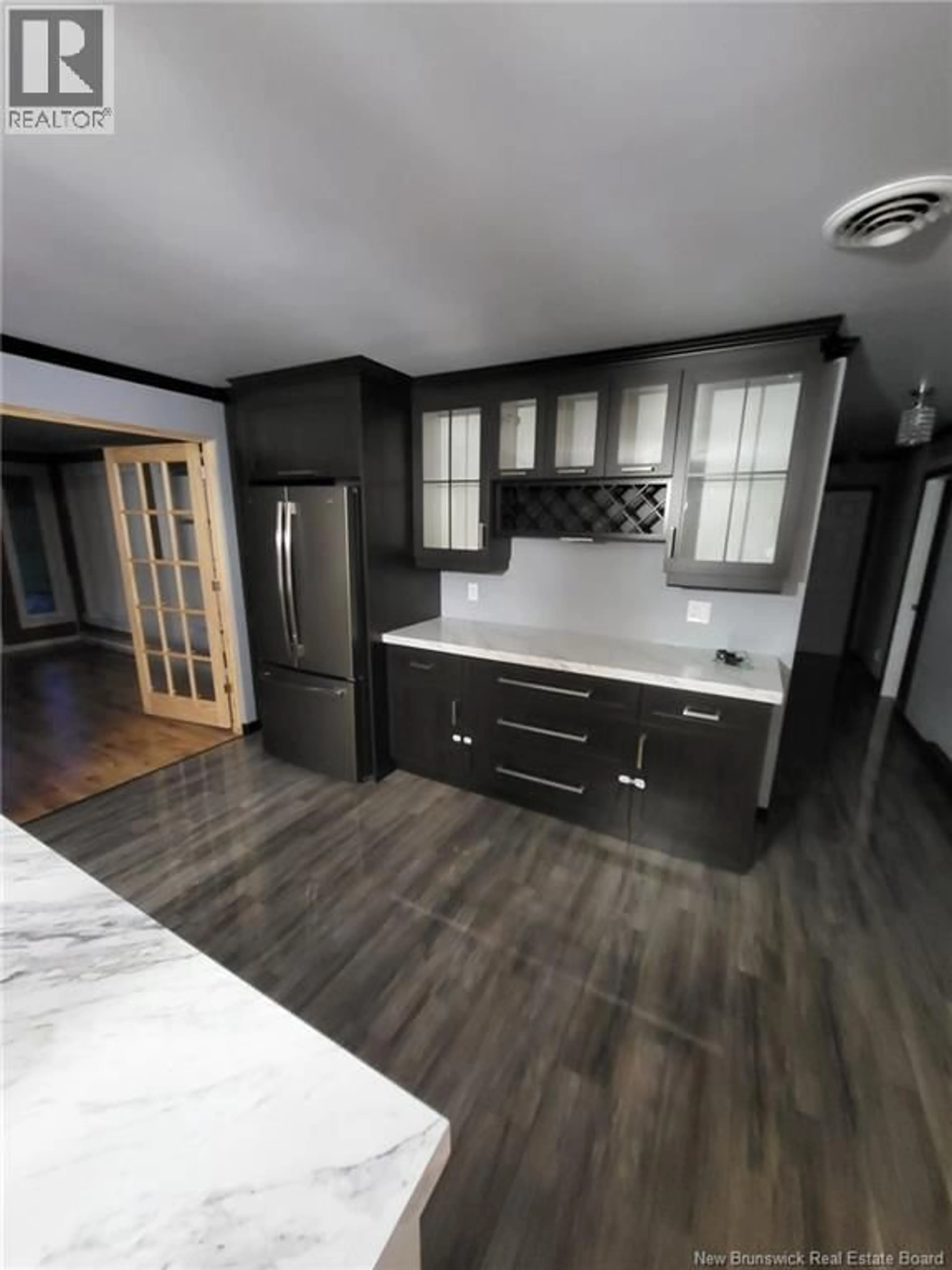 Open concept kitchen, wood/laminate floor for 2543 ROUTE 120, St-Hilaire New Brunswick E3V4T7