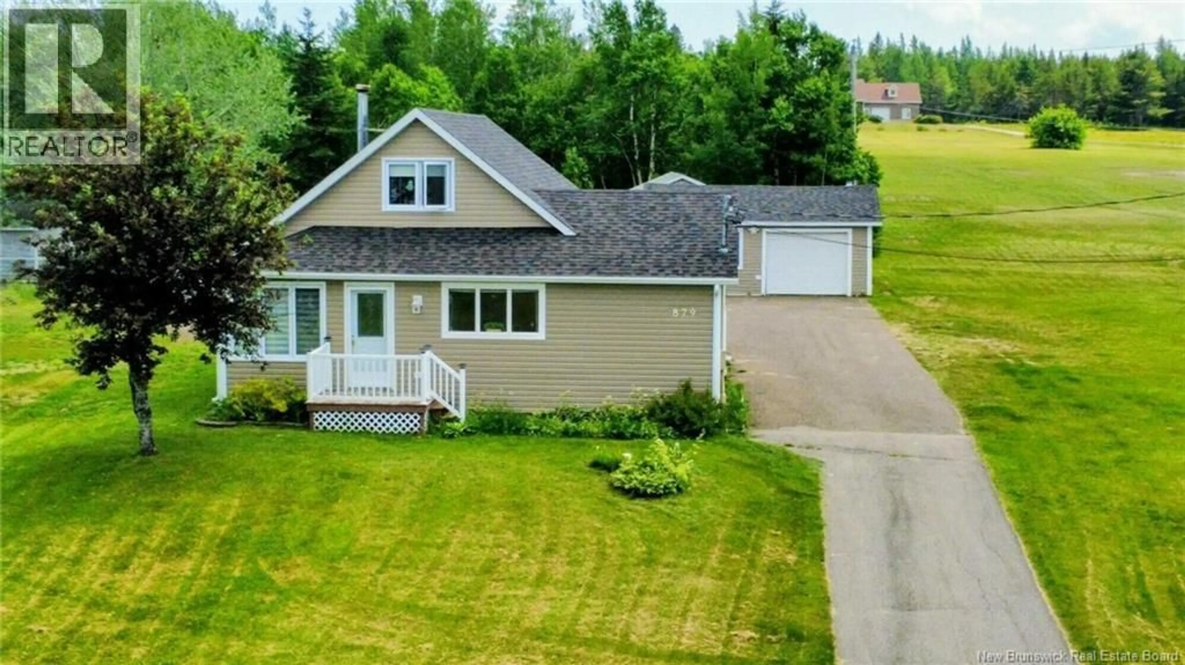 A pic from outside/outdoor area/front of a property/back of a property/a pic from drone, street for 879 BD DES ACADIENS, Bertrand New Brunswick E1W1H5