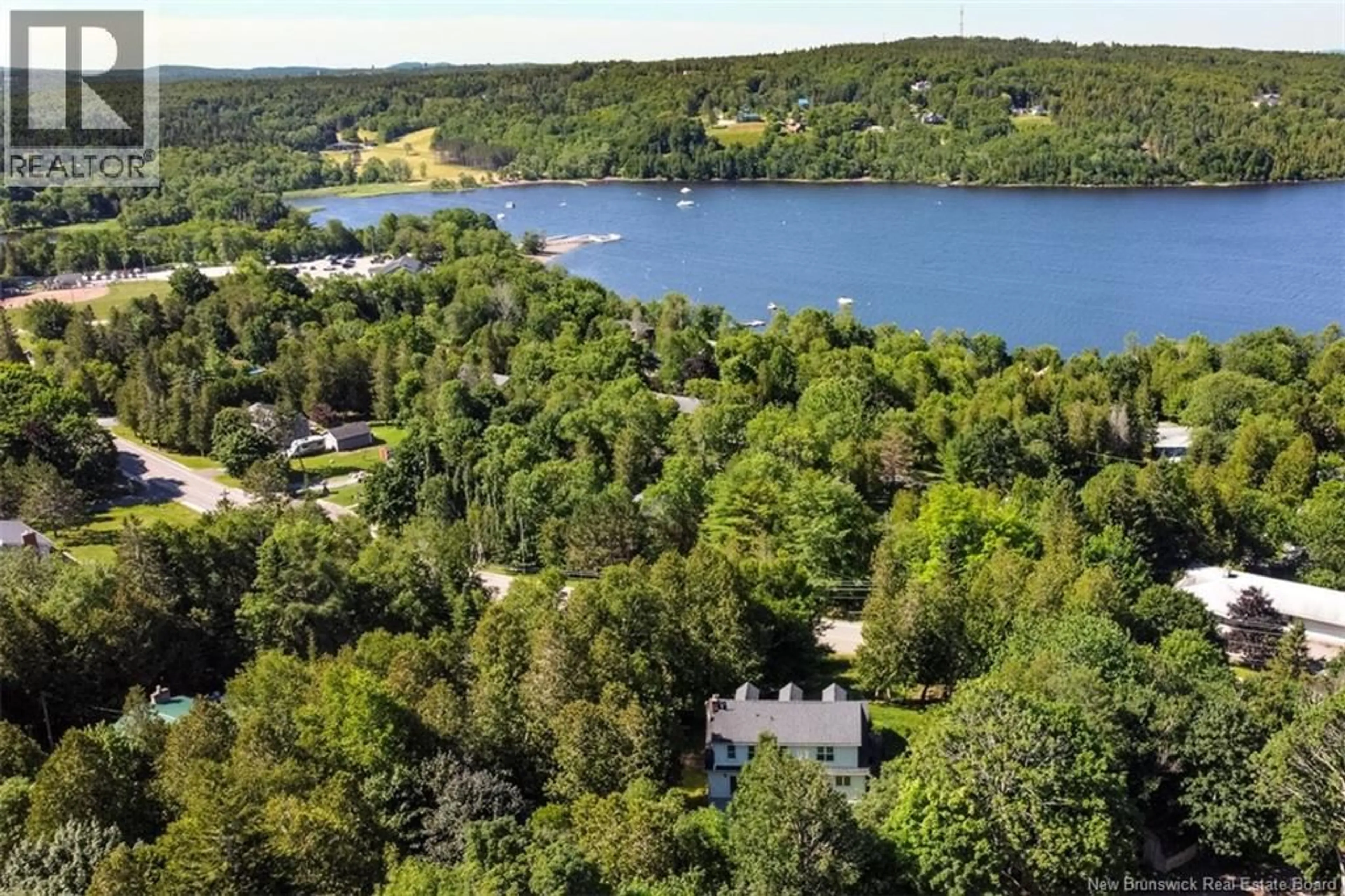 A pic from outside/outdoor area/front of a property/back of a property/a pic from drone, water/lake/river/ocean view for 244 MODEL FARM ROAD, Quispamsis New Brunswick E2G1M6