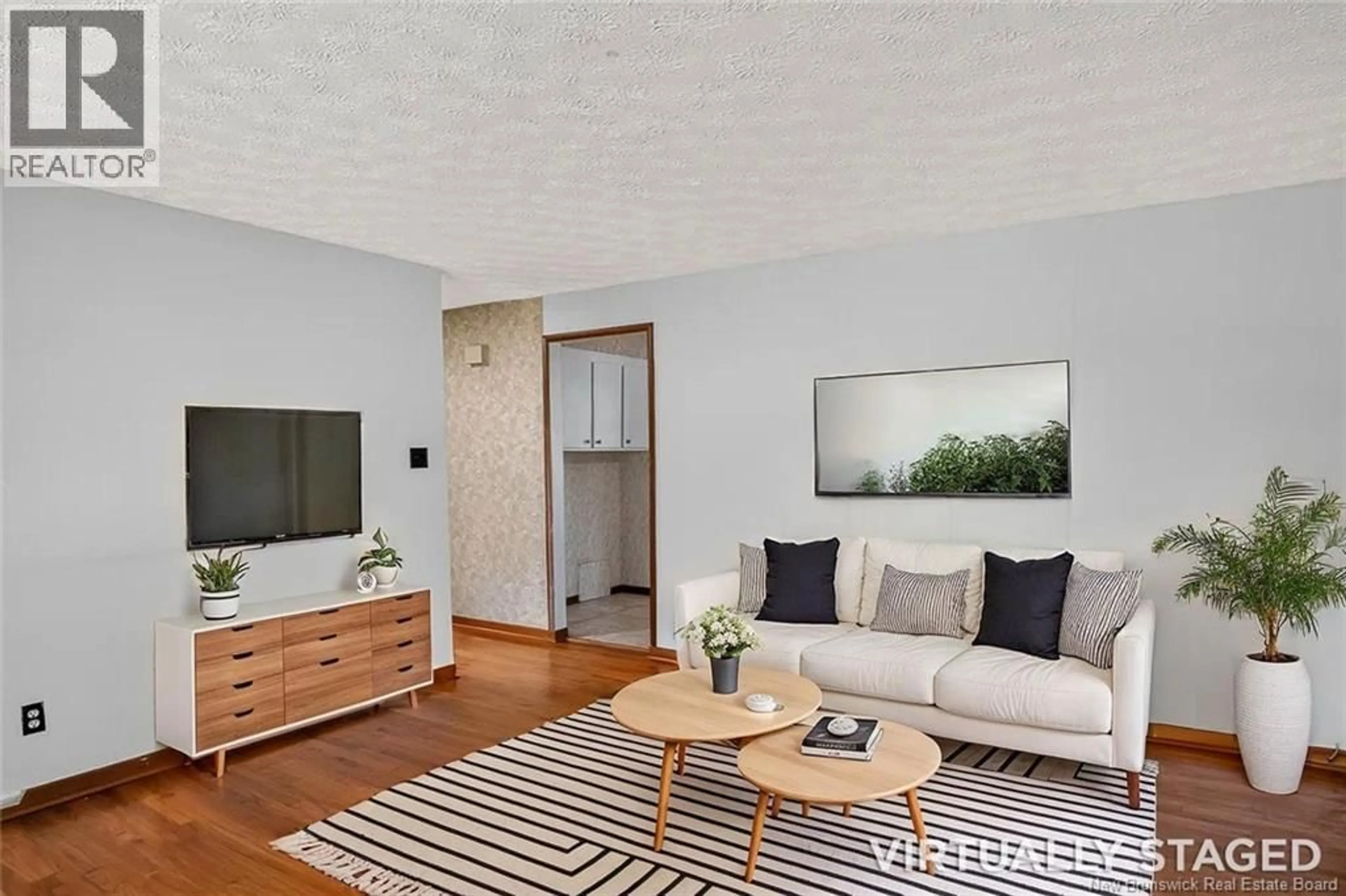 Living room with furniture, wood/laminate floor for 19 WOODWARD AVENUE, Saint John New Brunswick E2K1Z6