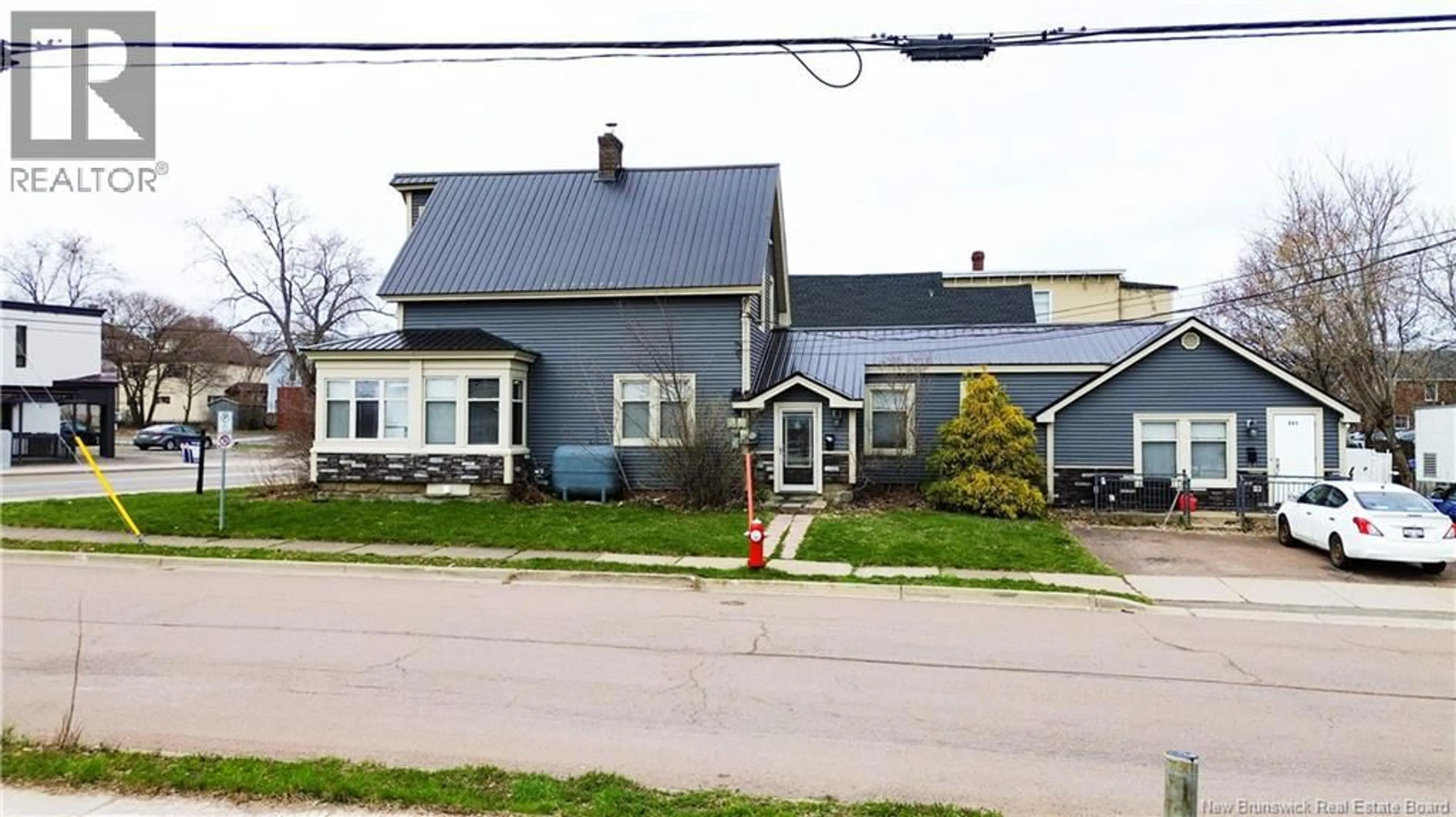 A pic from outside/outdoor area/front of a property/back of a property/a pic from drone, street for 203 MOUNTAIN ROAD, Moncton New Brunswick E1C2L5