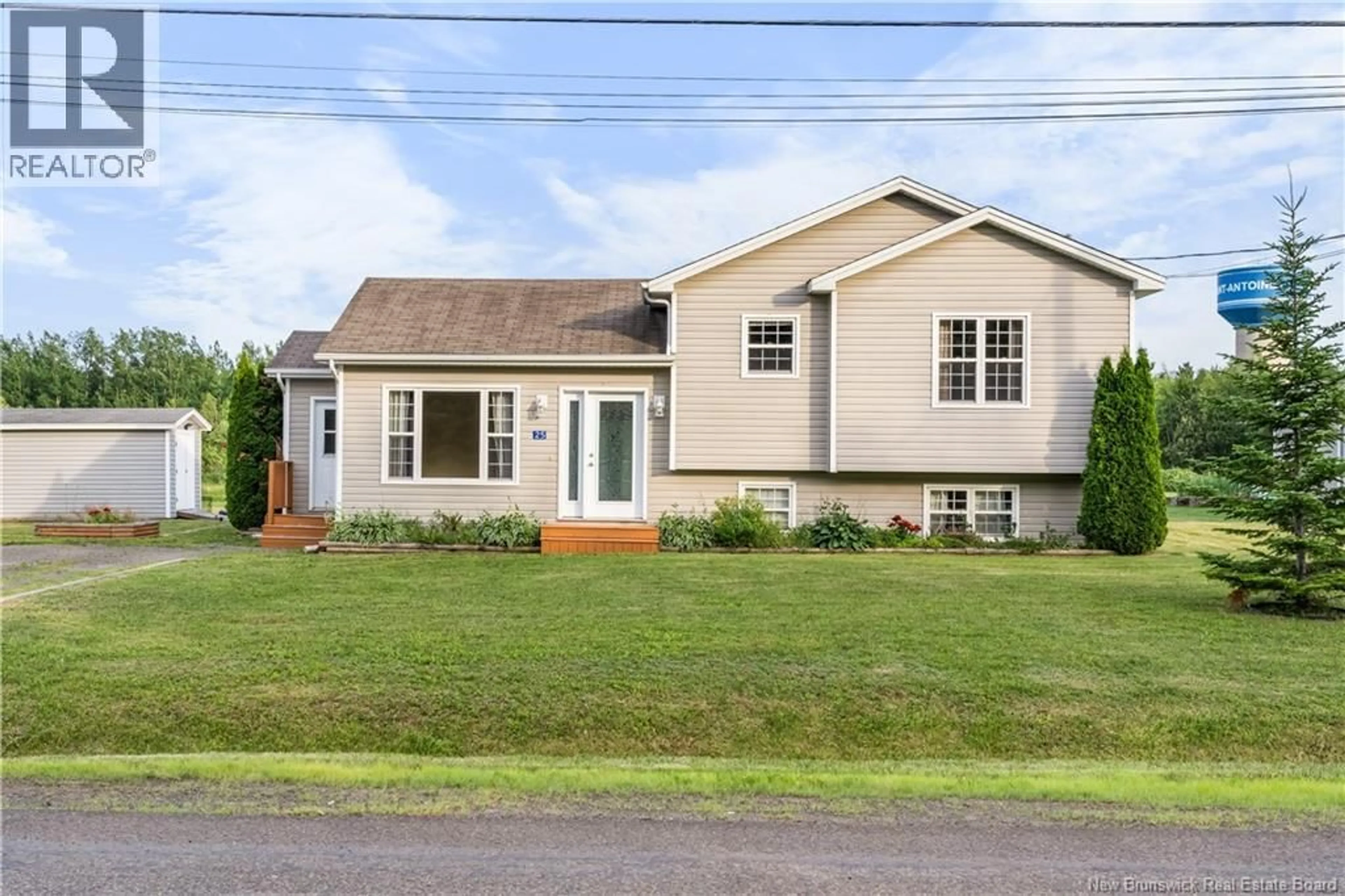 Home with vinyl exterior material, street for 25 CLEMENT AVENUE, Saint-Antoine New Brunswick E4V1E3