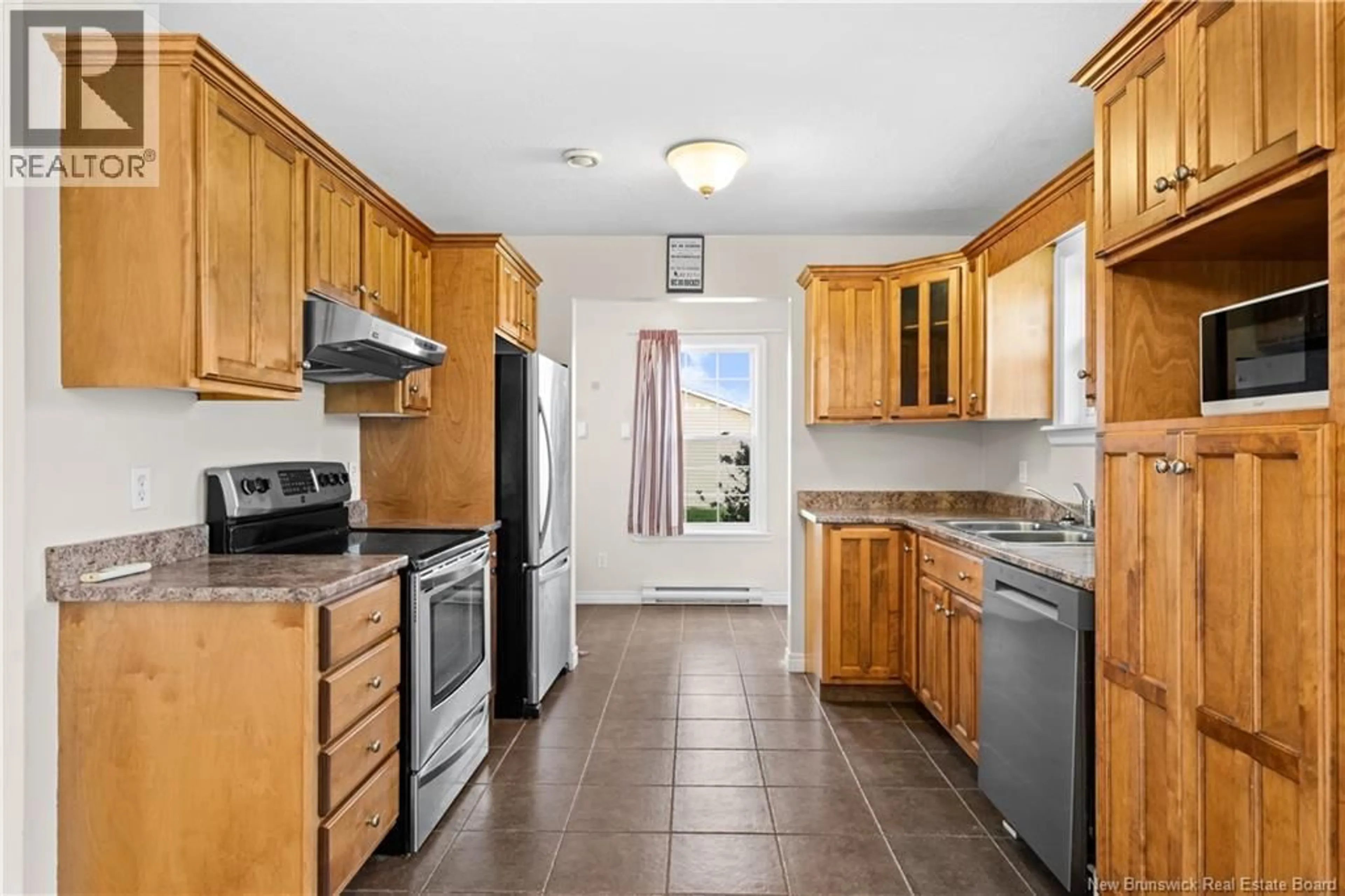 Standard kitchen, ceramic/tile floor for 25 CLEMENT AVENUE, Saint-Antoine New Brunswick E4V1E3
