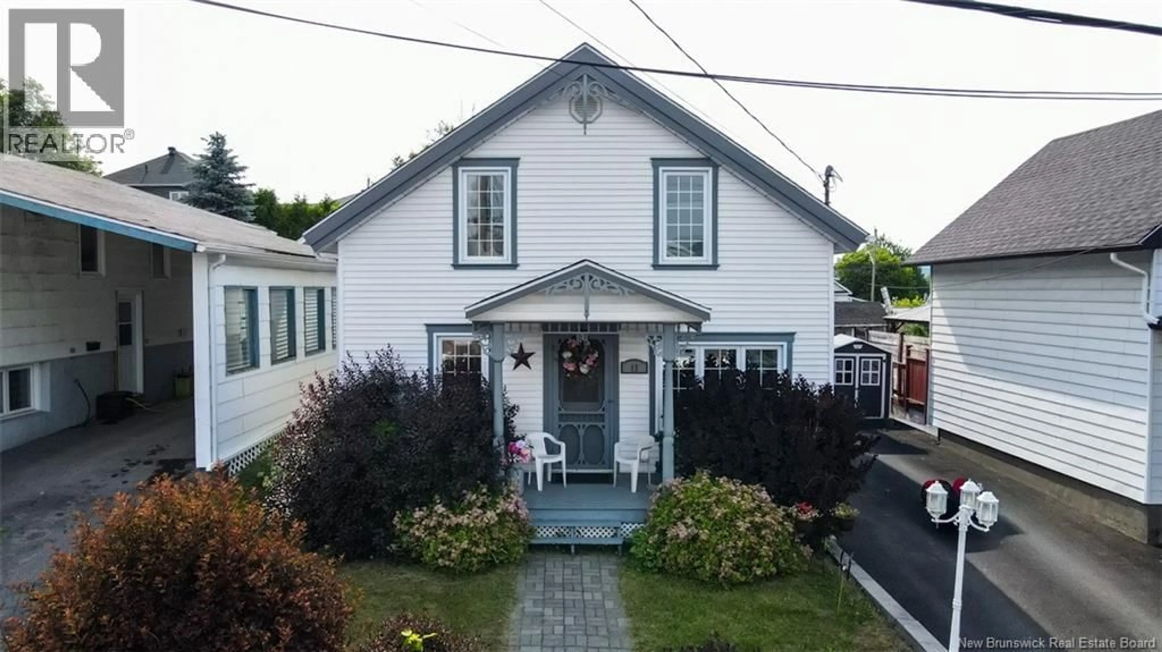 Home with vinyl exterior material, street for 11 33RD AVENUE, Edmundston New Brunswick E3V1S3