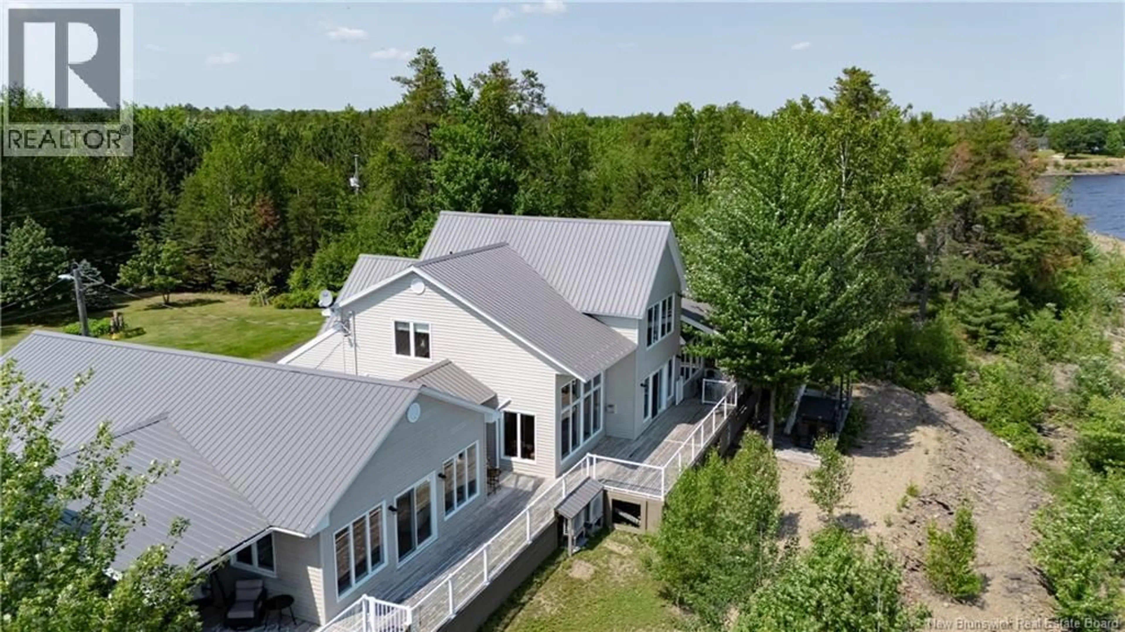 A pic from outside/outdoor area/front of a property/back of a property/a pic from drone, unknown for 72 COTTAGE ROAD, Printz Cove New Brunswick E4B4A3