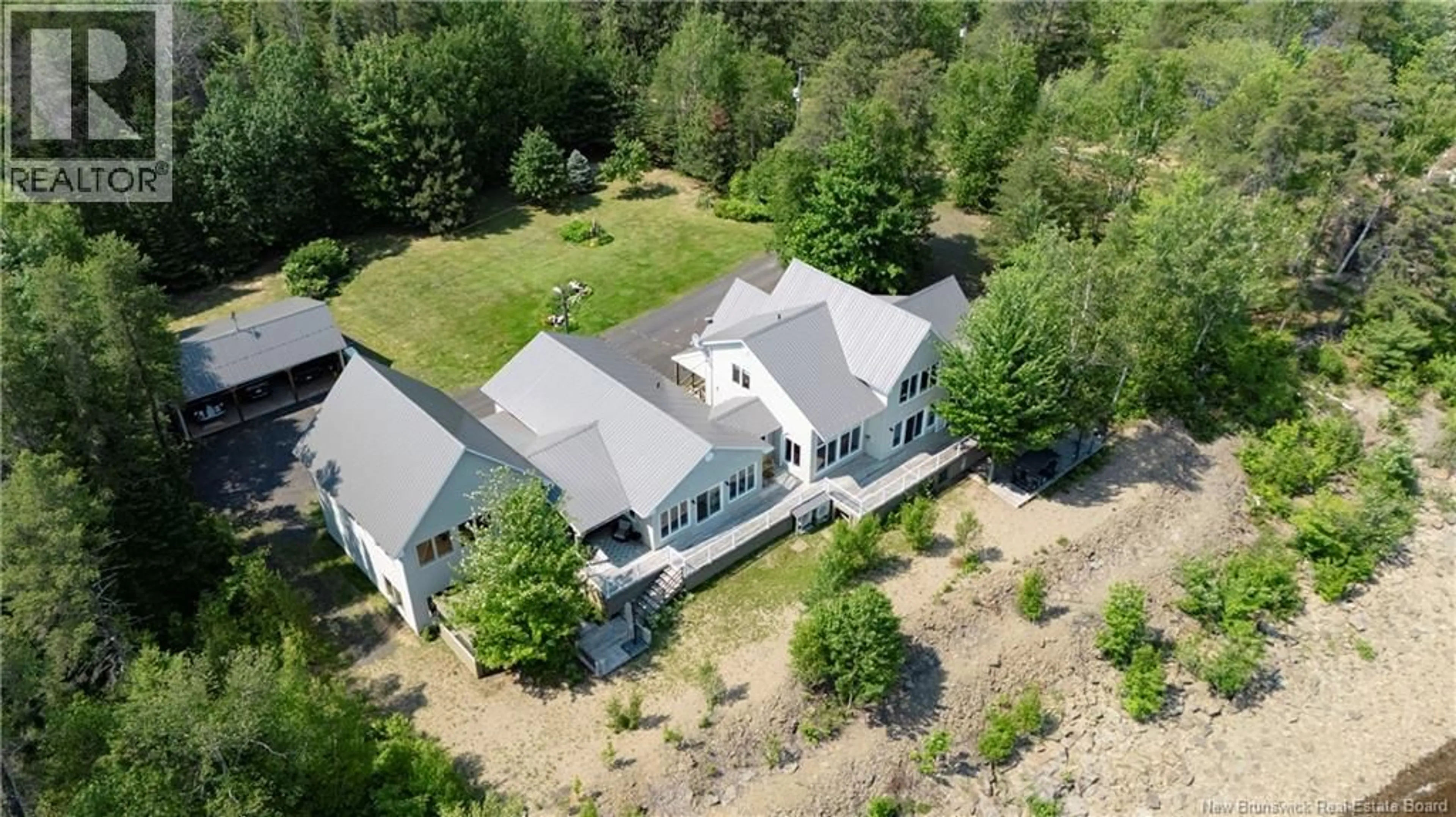 A pic from outside/outdoor area/front of a property/back of a property/a pic from drone, unknown for 72 COTTAGE ROAD, Printz Cove New Brunswick E4B4A3