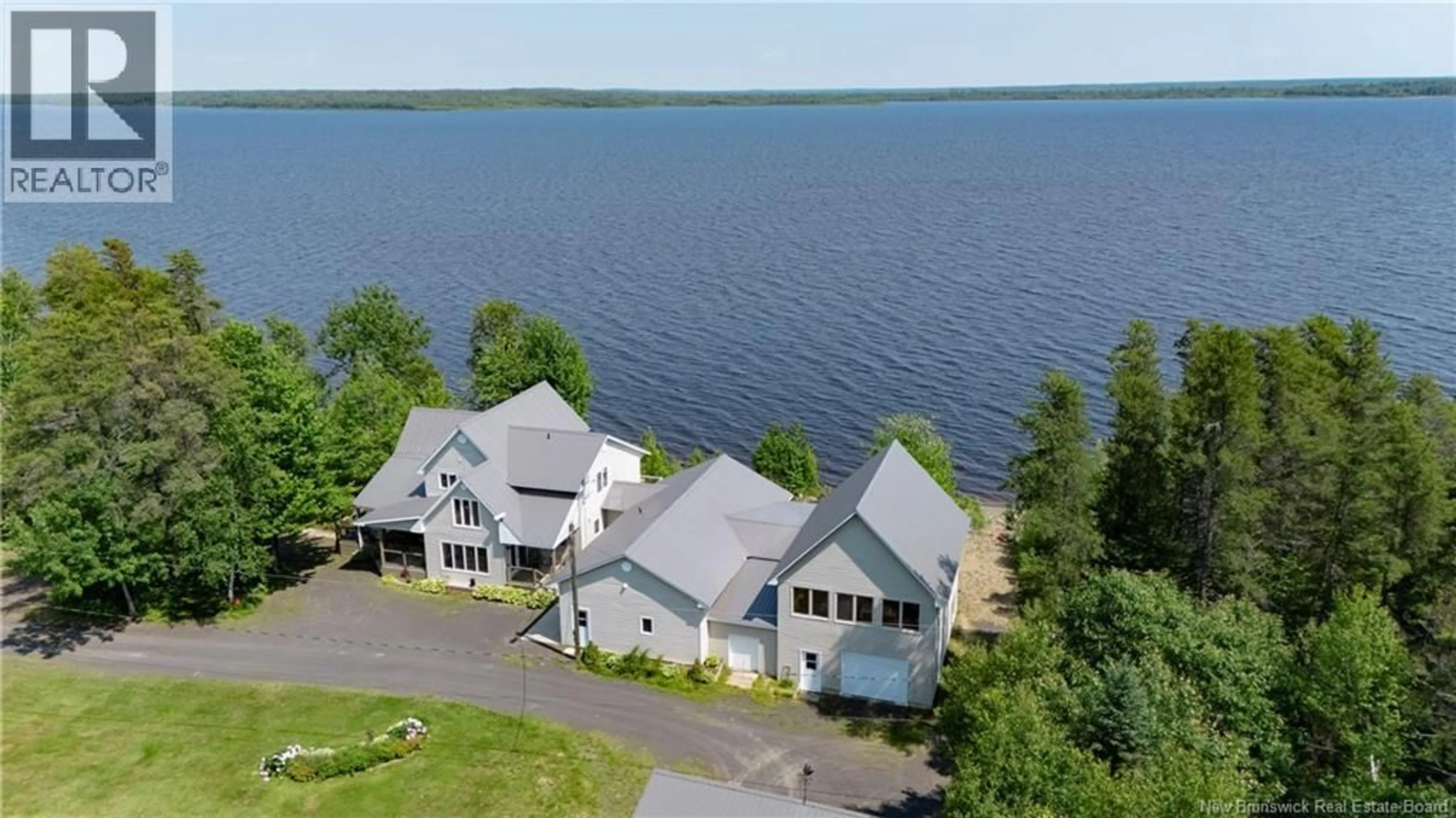 A pic from outside/outdoor area/front of a property/back of a property/a pic from drone, water/lake/river/ocean view for 72 COTTAGE ROAD, Printz Cove New Brunswick E4B4A3