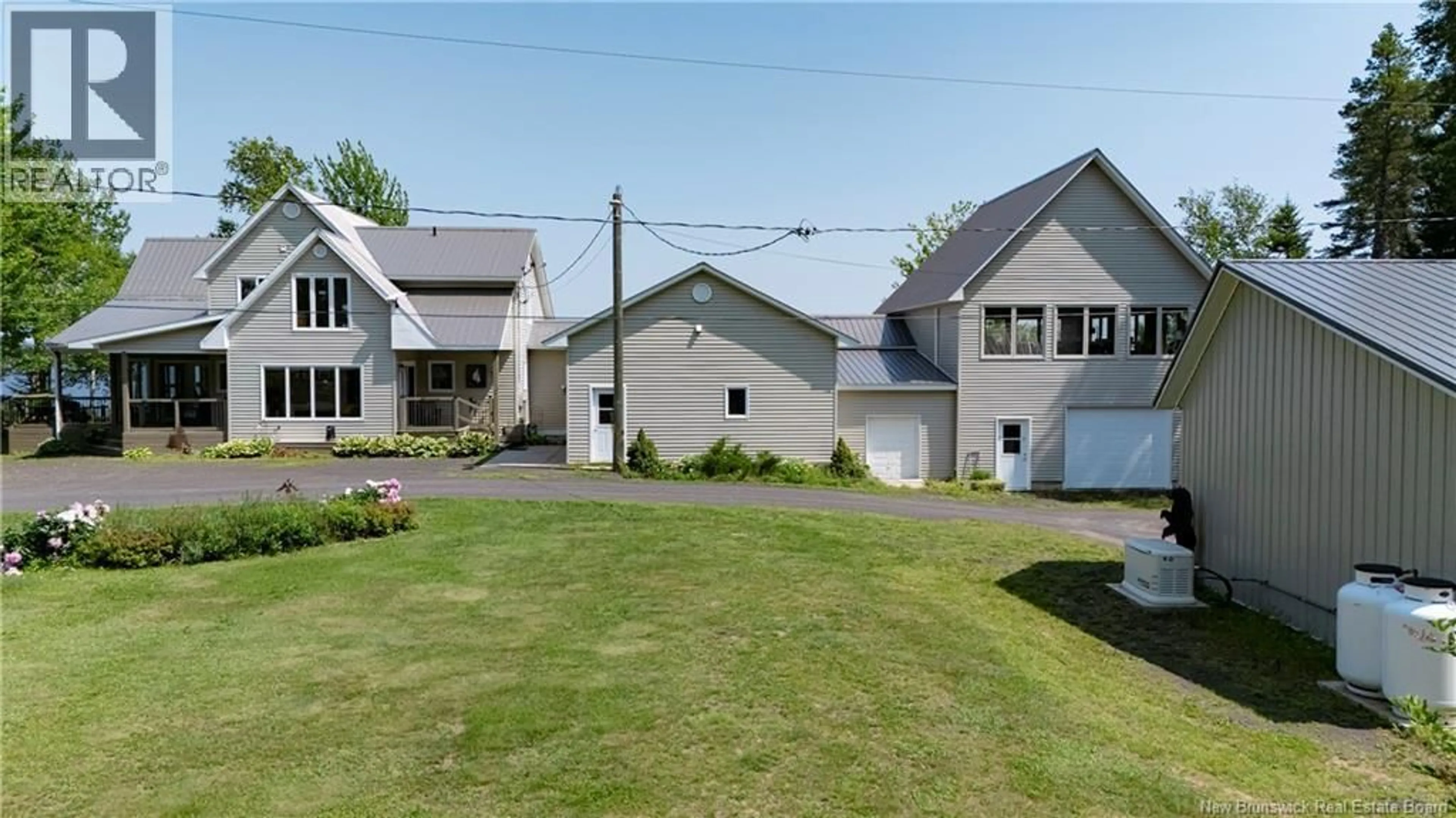 A pic from outside/outdoor area/front of a property/back of a property/a pic from drone, street for 72 COTTAGE ROAD, Printz Cove New Brunswick E4B4A3