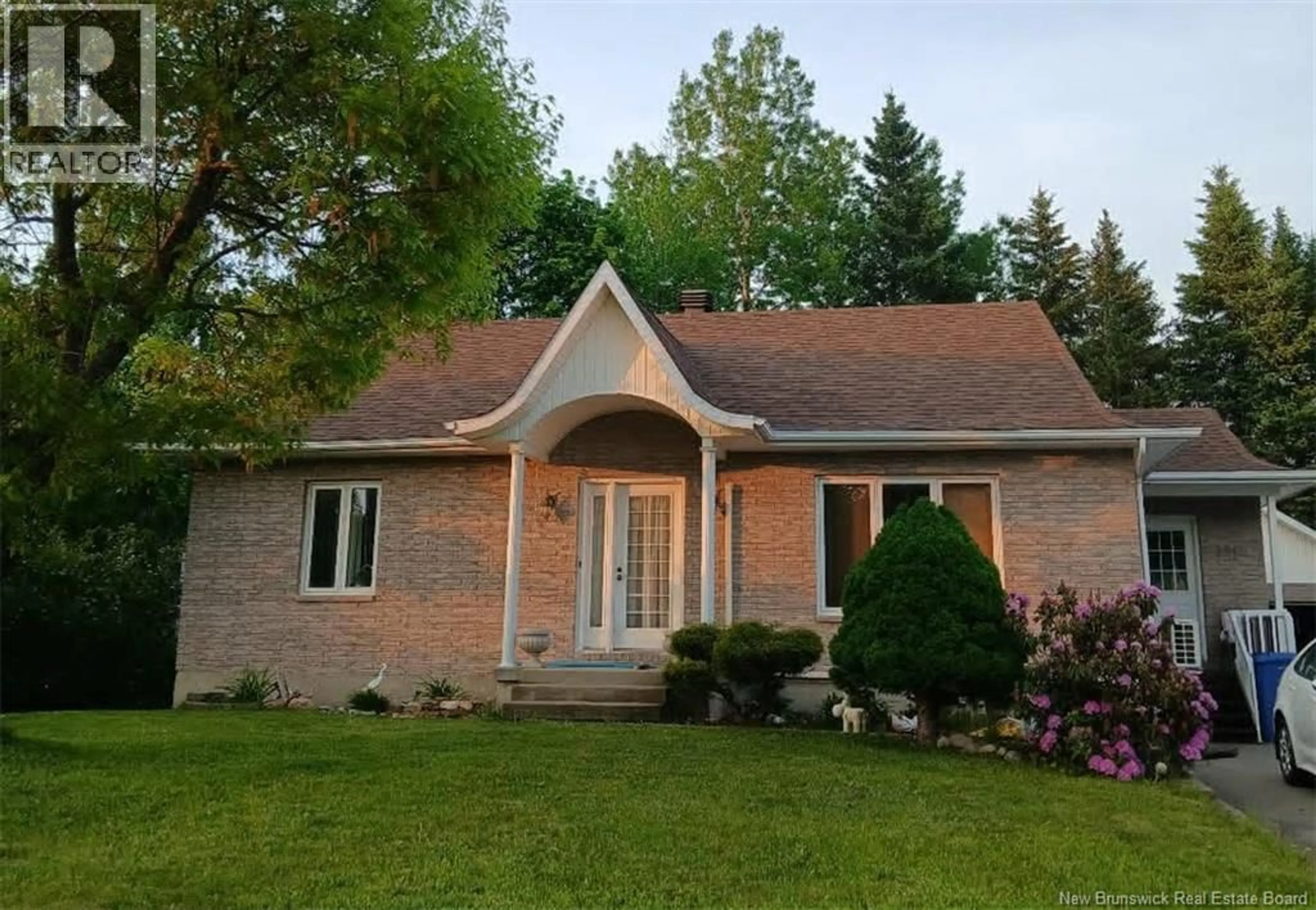 Home with brick exterior material, unknown for 1071 MISHO STREET, Beresford New Brunswick E8K1H5