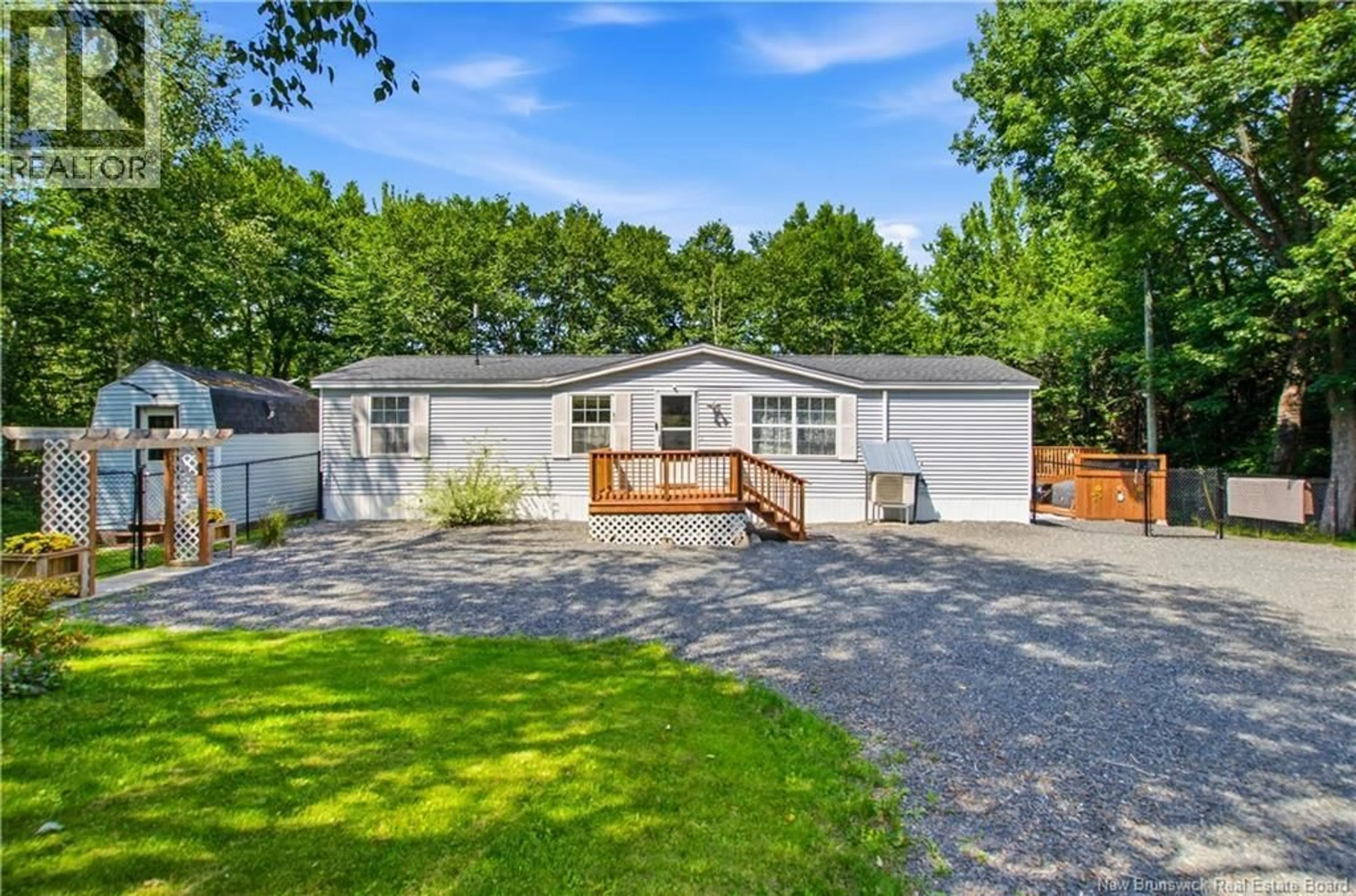 Home with vinyl exterior material, street for 198 LAKE DRIVE, Minto New Brunswick E4B2M8