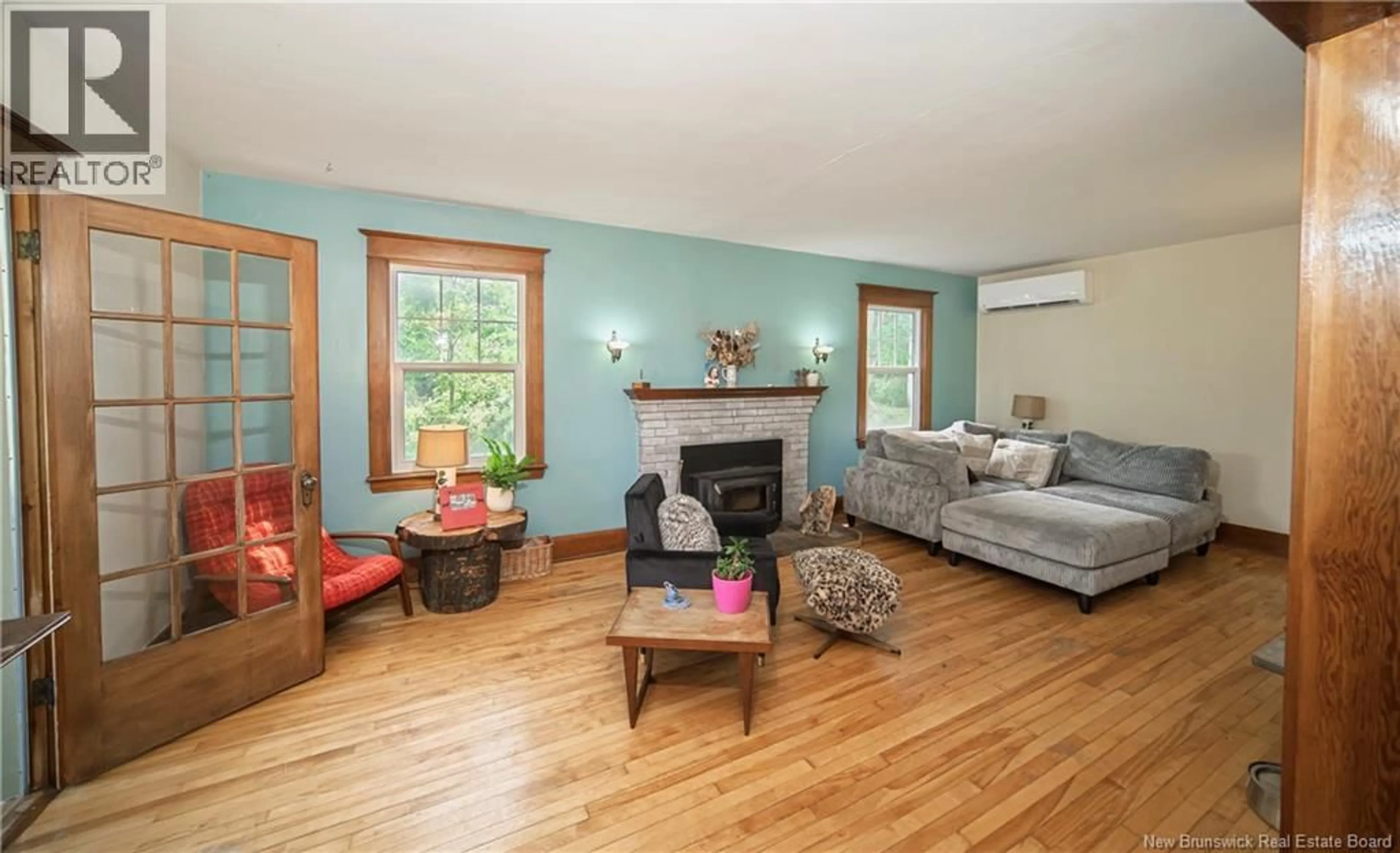 Living room with furniture, wood/laminate floor for 29 FRONT STREET, Gagetown New Brunswick E5M1A2