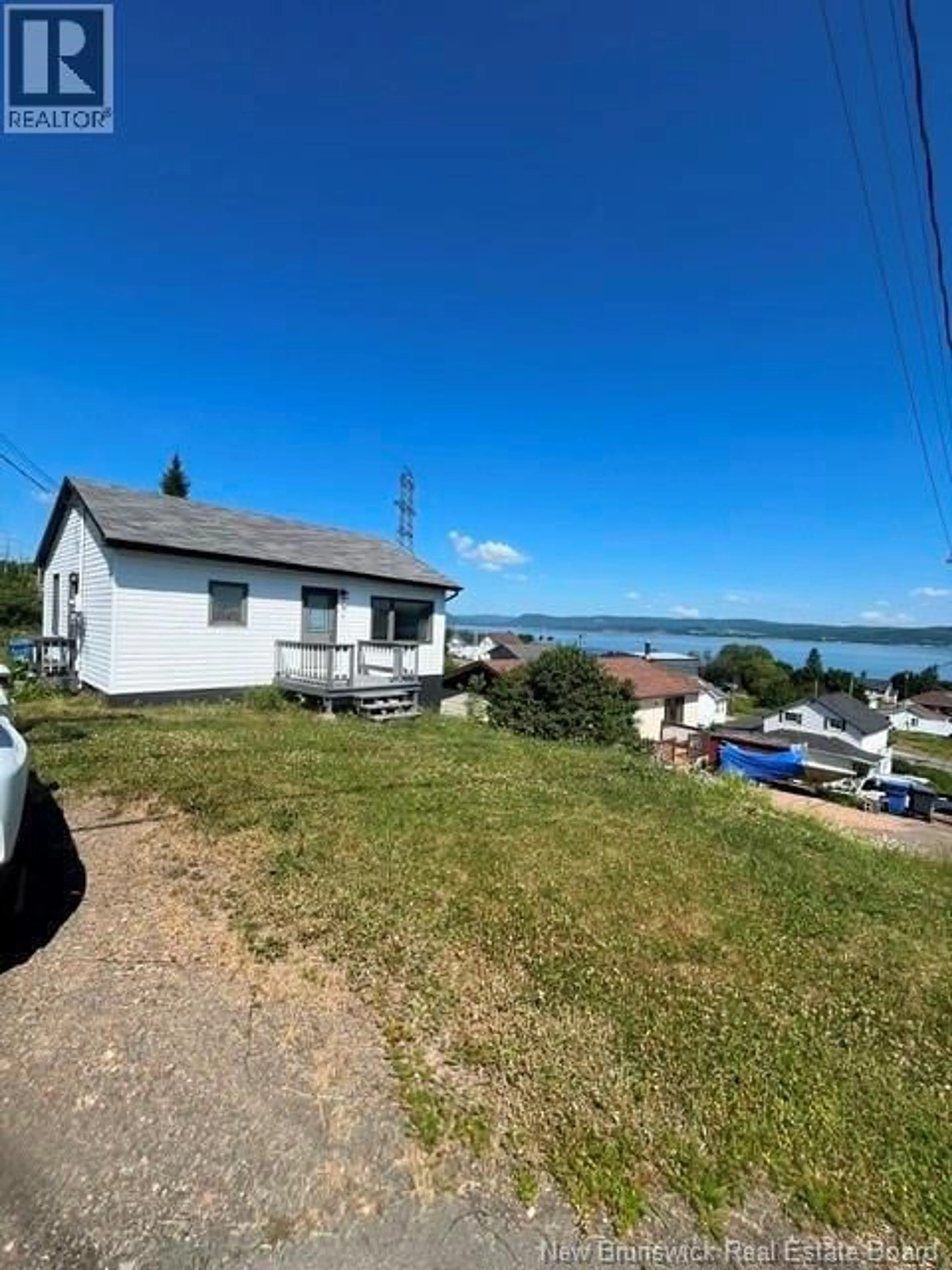A pic from outside/outdoor area/front of a property/back of a property/a pic from drone, water/lake/river/ocean view for 138 BEARSE STREET, Dalhousie New Brunswick E8C1E6