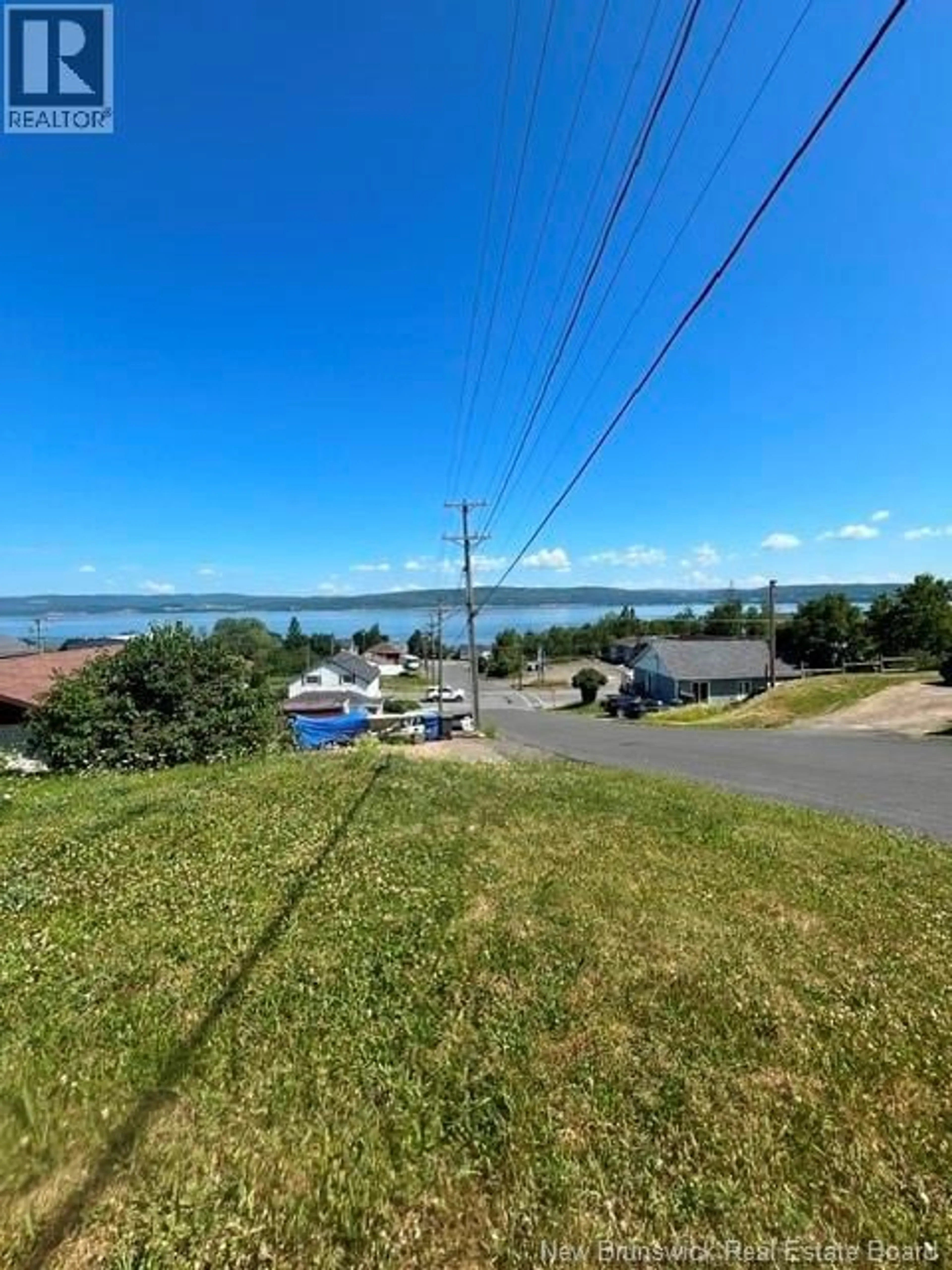 A pic from outside/outdoor area/front of a property/back of a property/a pic from drone, water/lake/river/ocean view for 138 BEARSE STREET, Dalhousie New Brunswick E8C1E6