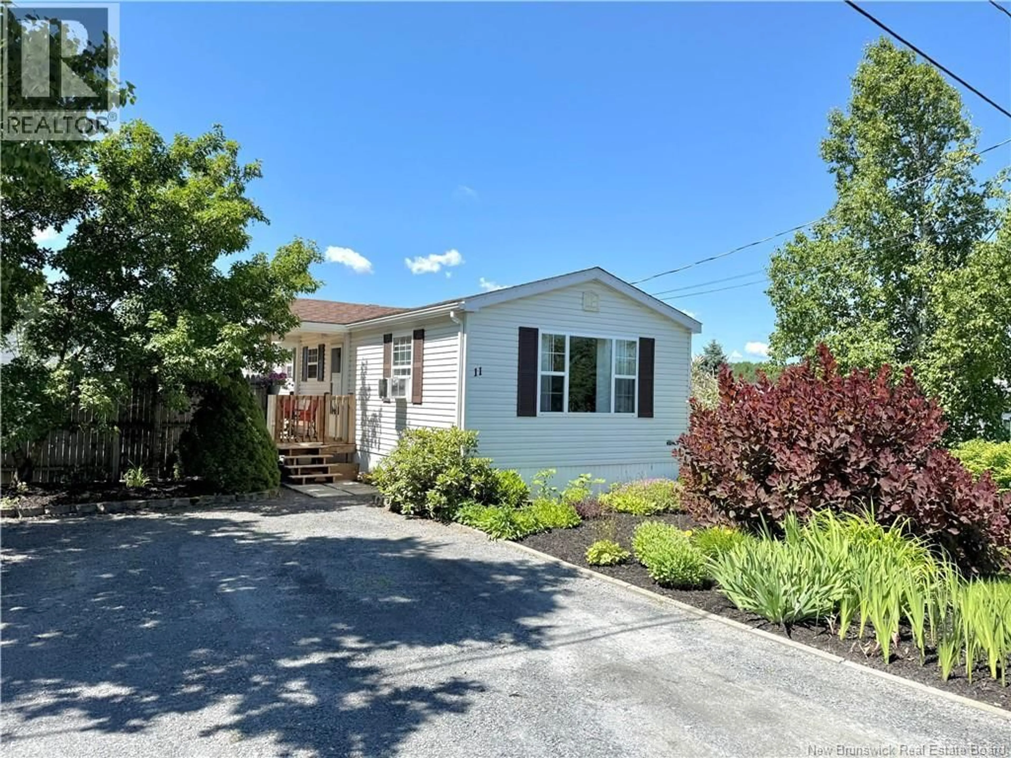 Home with vinyl exterior material, street for 11 PASCAL STREET, Saint-Jacques New Brunswick E7B2X4