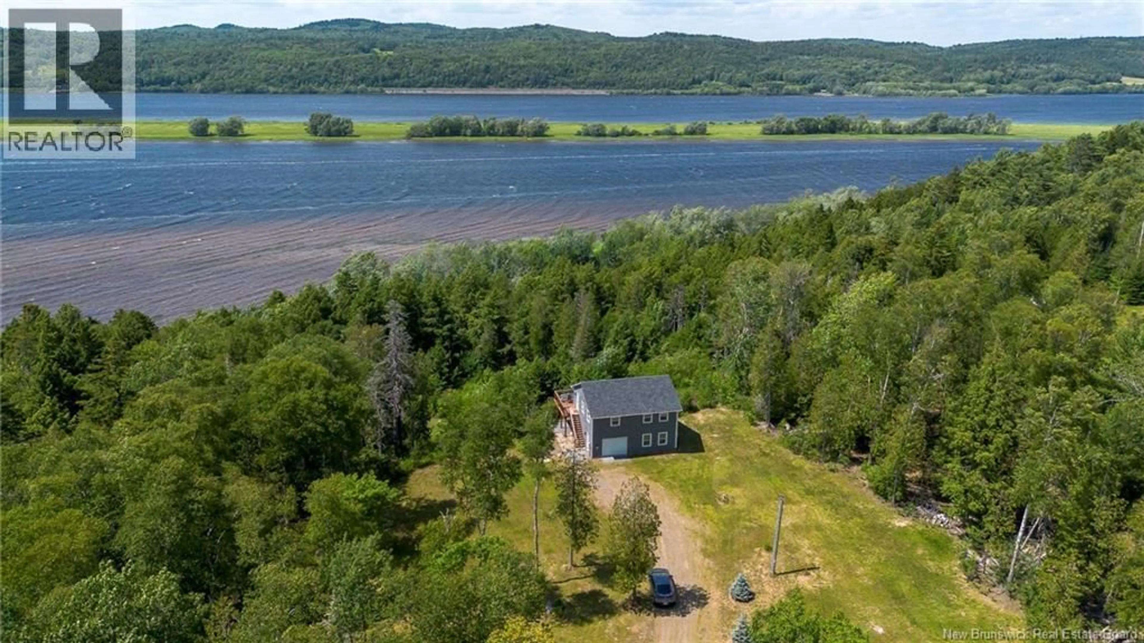 A pic from outside/outdoor area/front of a property/back of a property/a pic from drone, water/lake/river/ocean view for 113 GORHAMS BLUFF ROAD, Kingston New Brunswick E5N0B9
