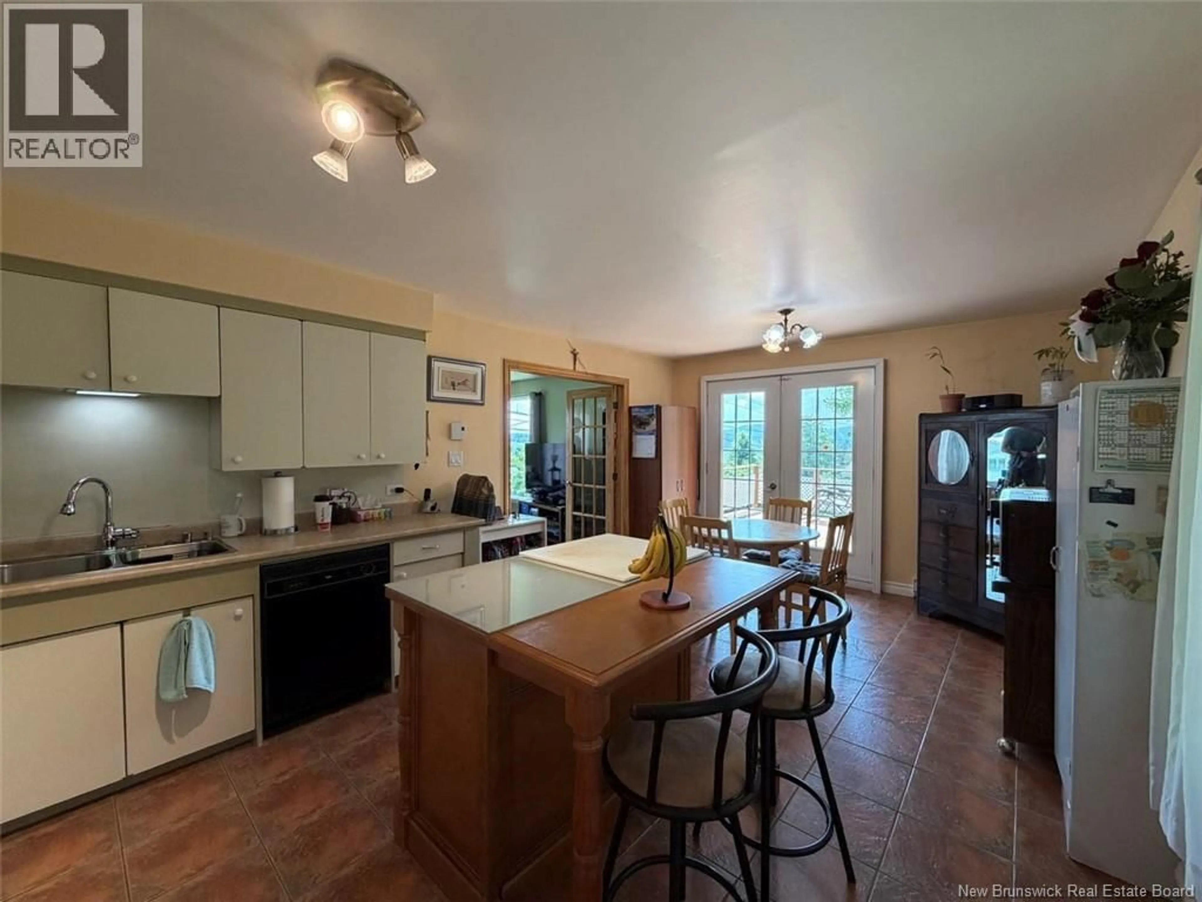 Open concept kitchen, ceramic/tile floor for 199 BELLEVUE STREET, Edmundston New Brunswick E3V2E4
