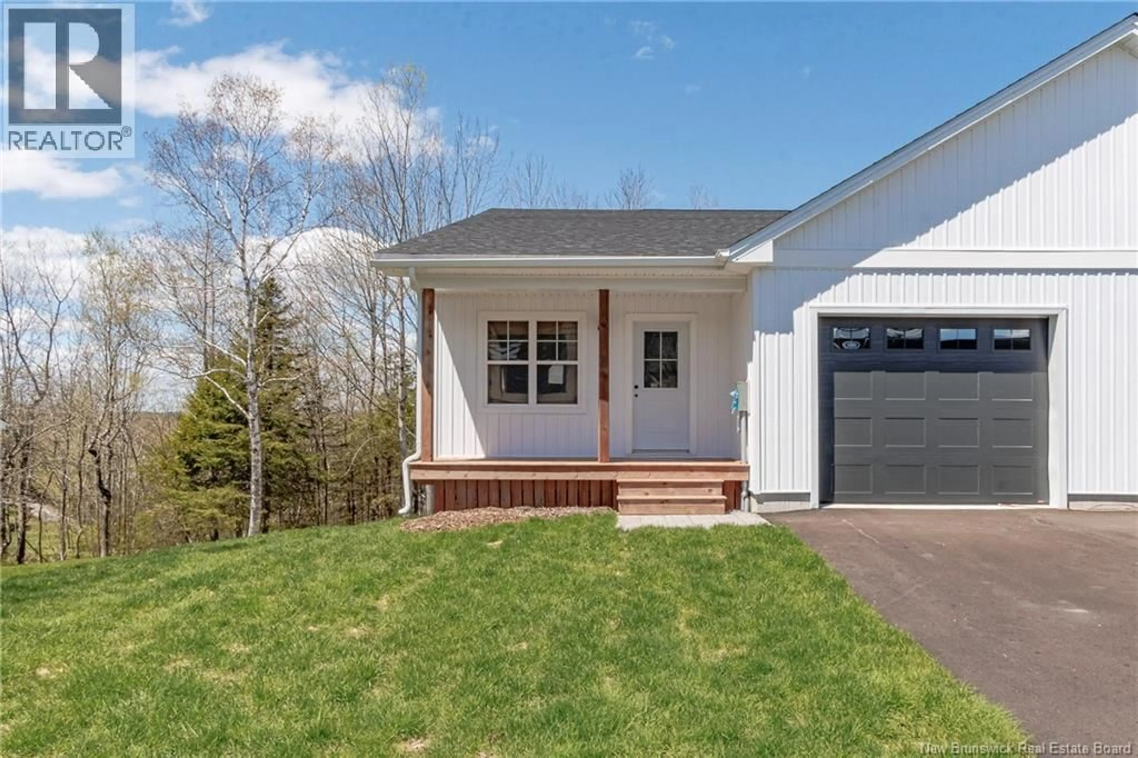 Home with vinyl exterior material, street for 329 HAMPTON ROAD, Quispamsis New Brunswick E2E4T1