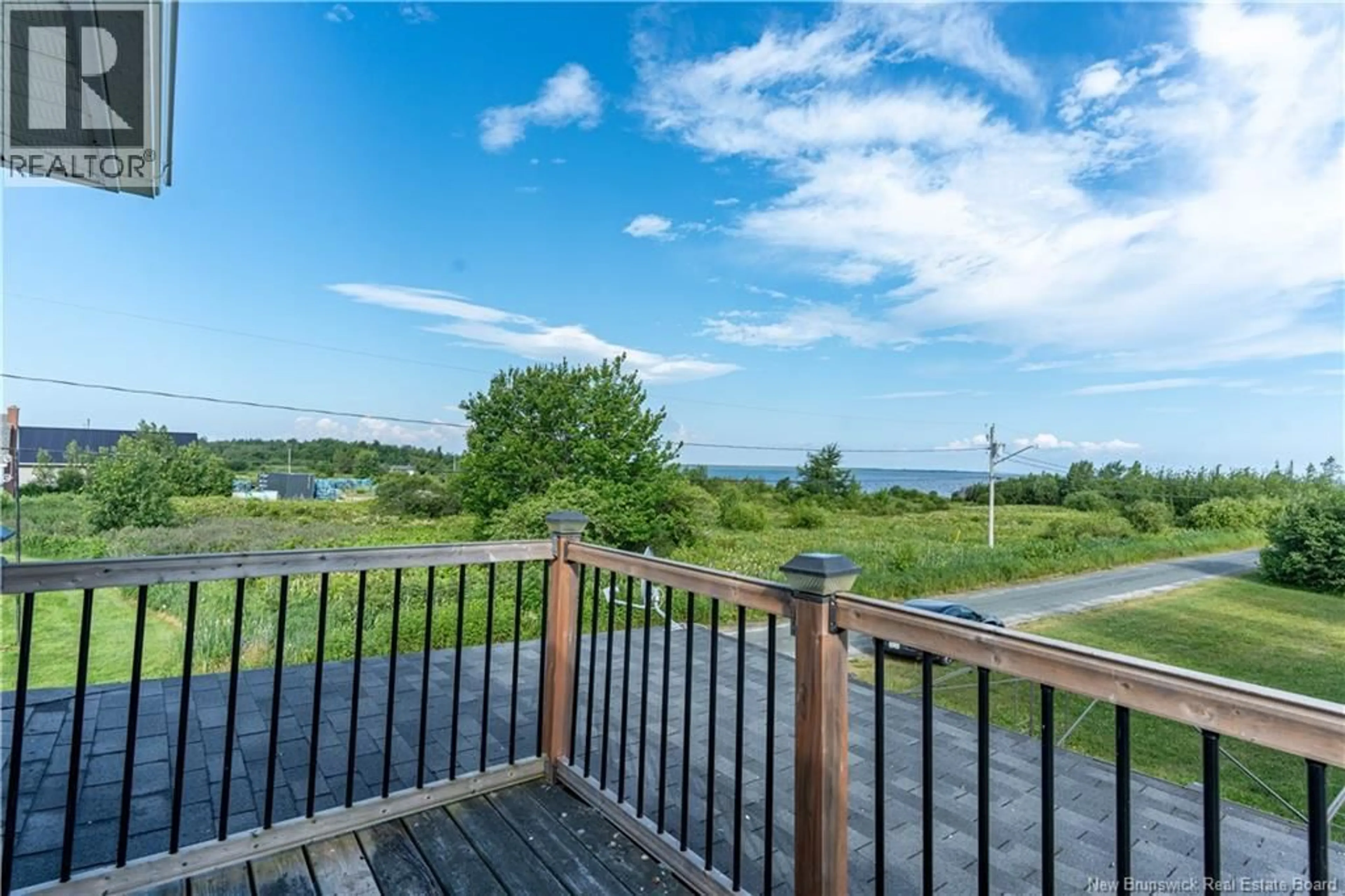 A pic from outside/outdoor area/front of a property/back of a property/a pic from drone, water/lake/river/ocean view for 4 GREGG STREET, Baie-Sainte-Anne New Brunswick E9A1B3