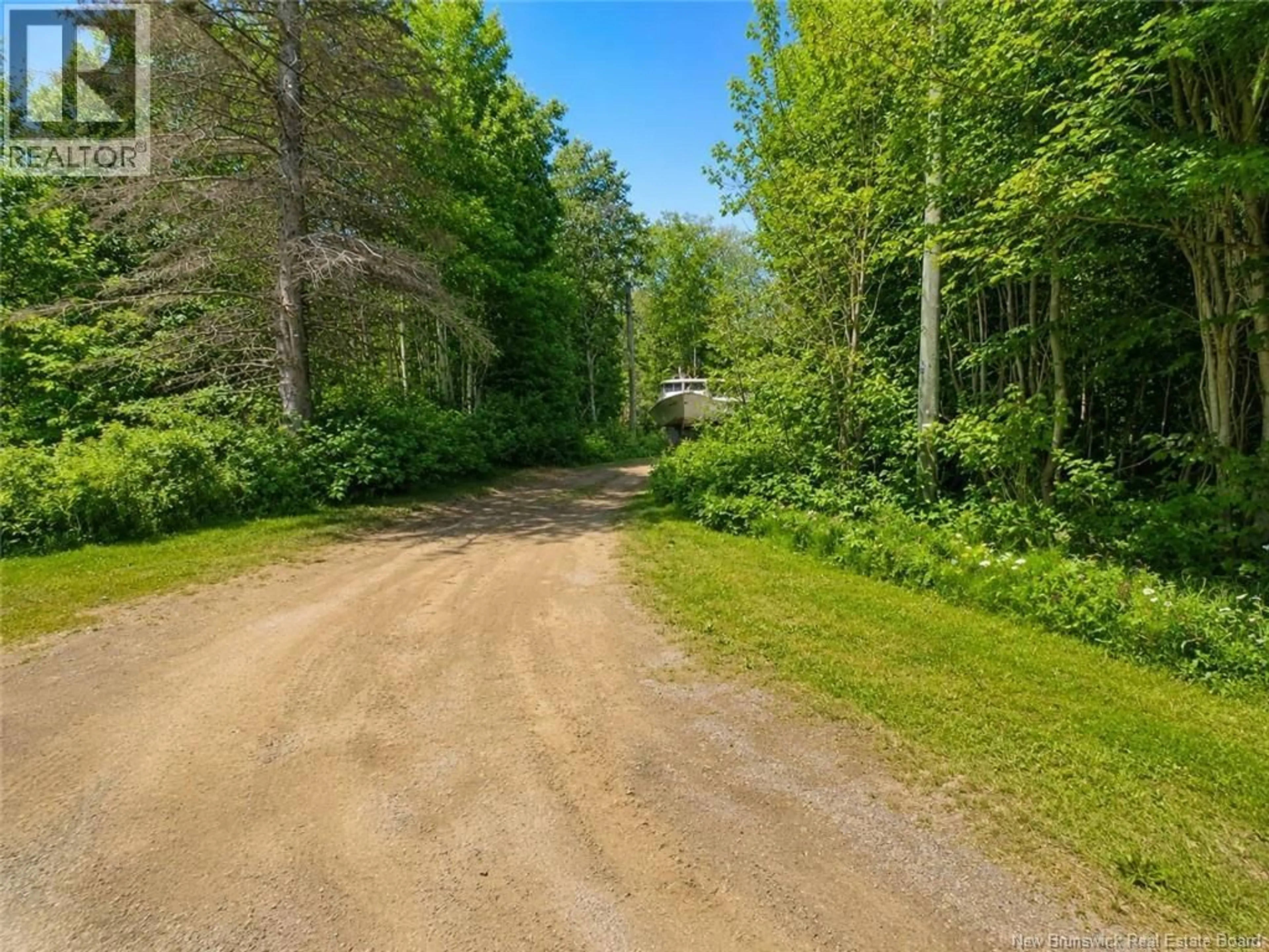 A pic from outside/outdoor area/front of a property/back of a property/a pic from drone, forest/trees view for 230 WILSON POINT, Miscou New Brunswick E8T4R4